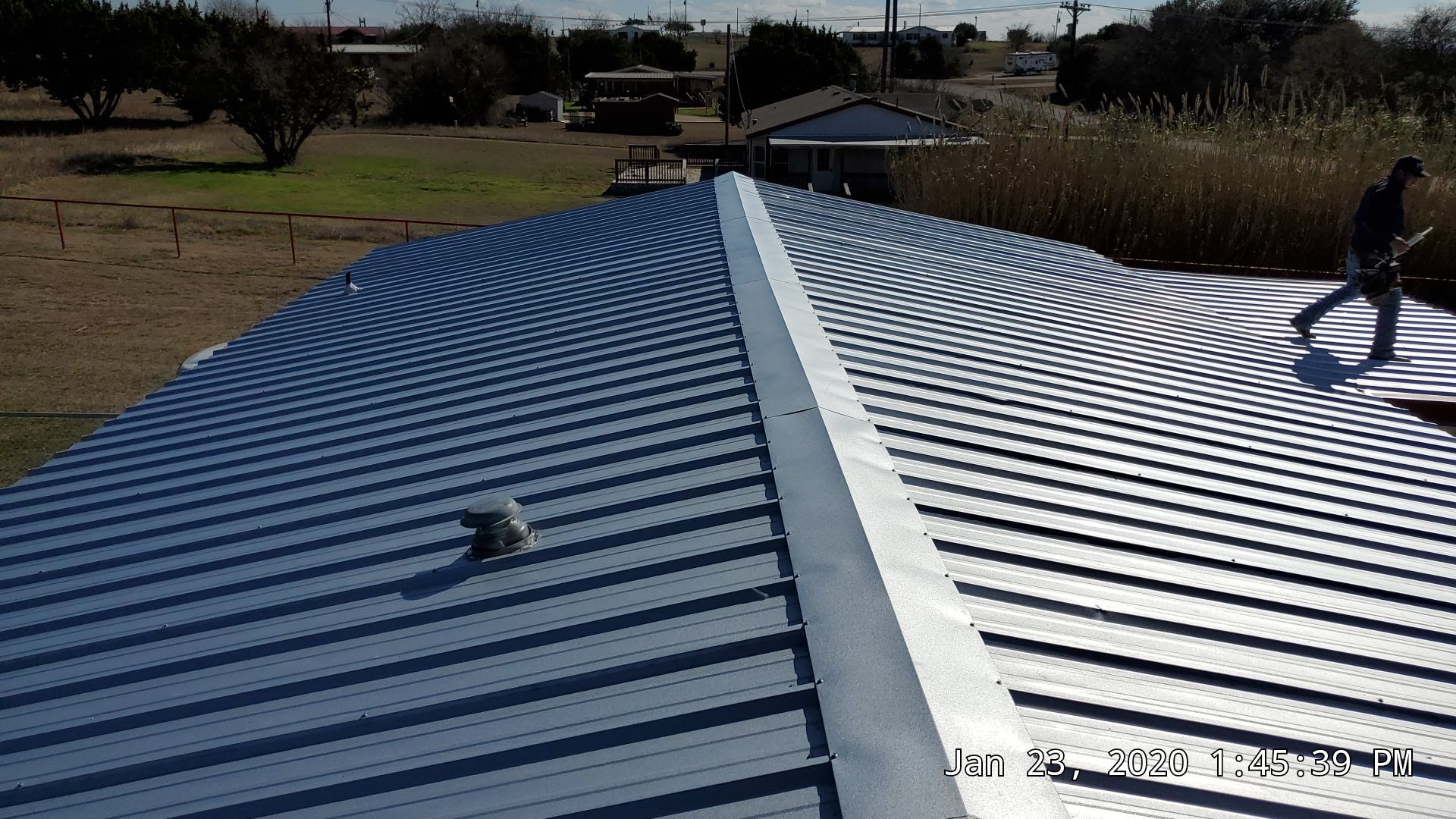 Residential Roofing Installation using PBR Metal Roof by Harvey Roofing & Construction