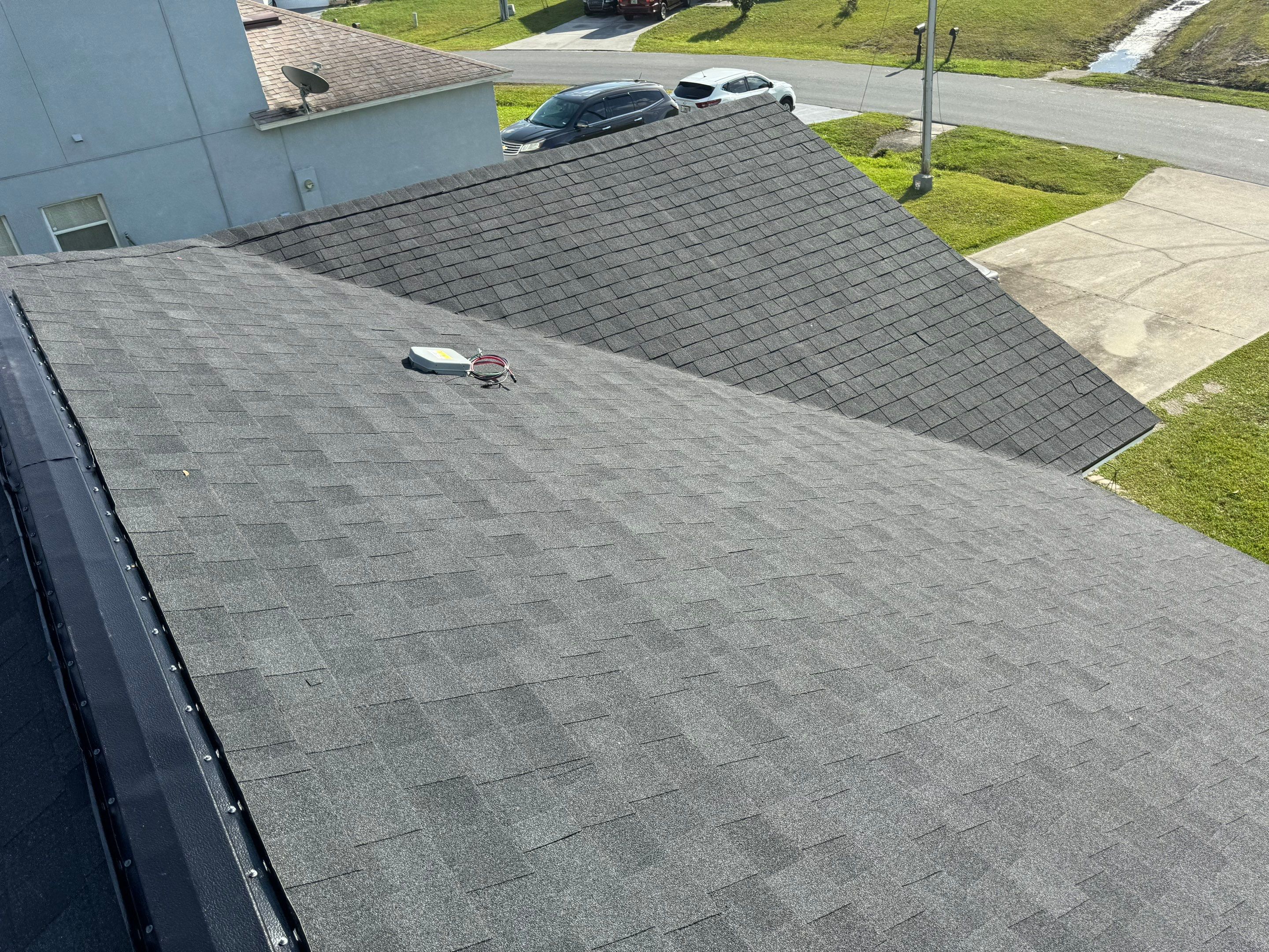 Estate Gray Shingles by Reimagine Roofing