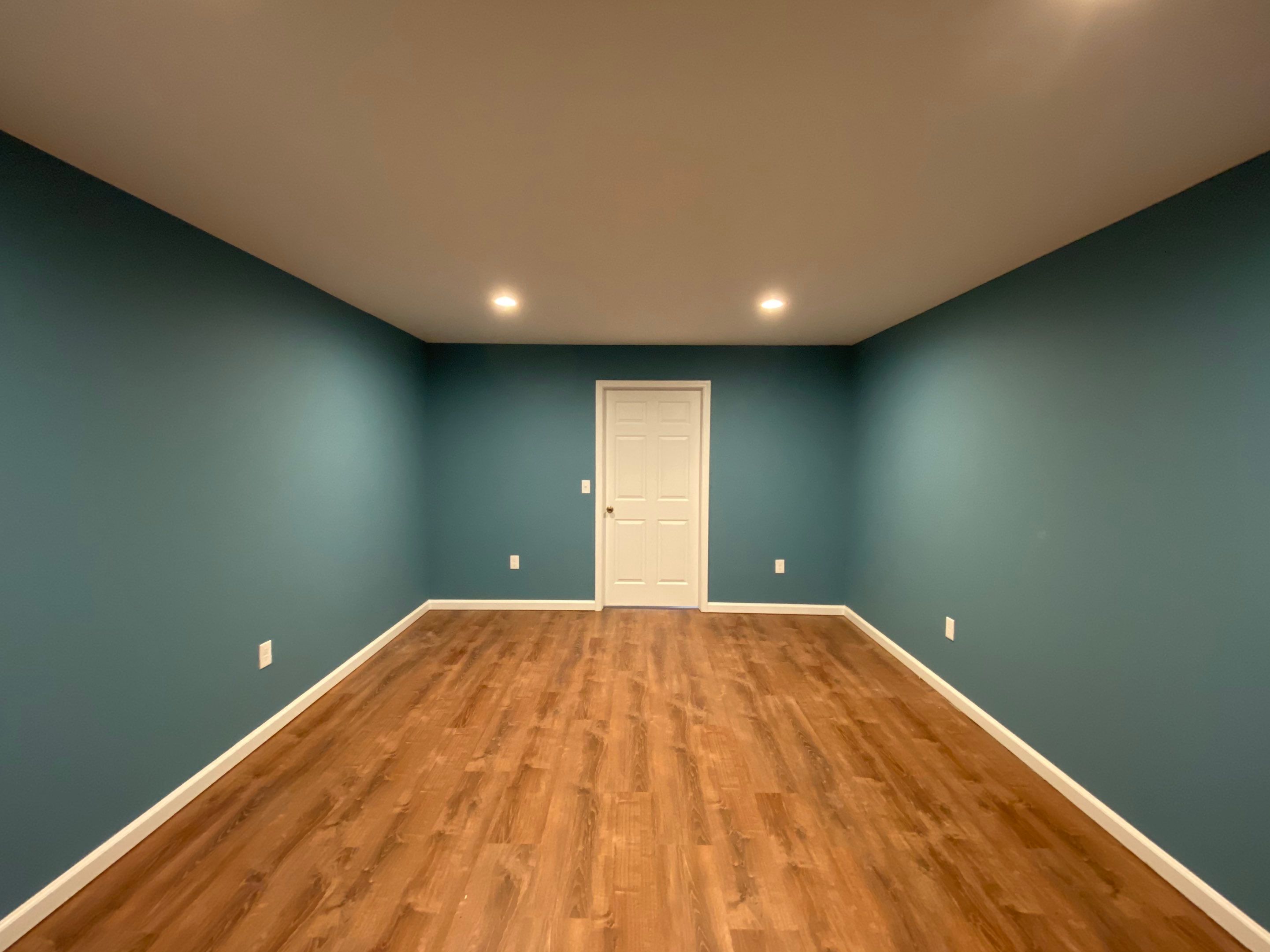 Finished Basement Transformation With Luxury Vinyl Plank Flooring in Acworth by Swift Home Renovations