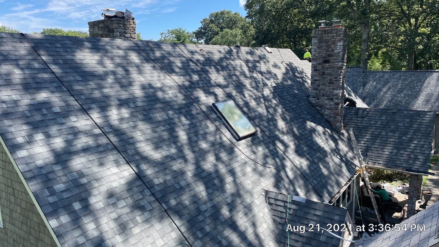 Roof Replacement using IKO Dynasty by American Home Contractors