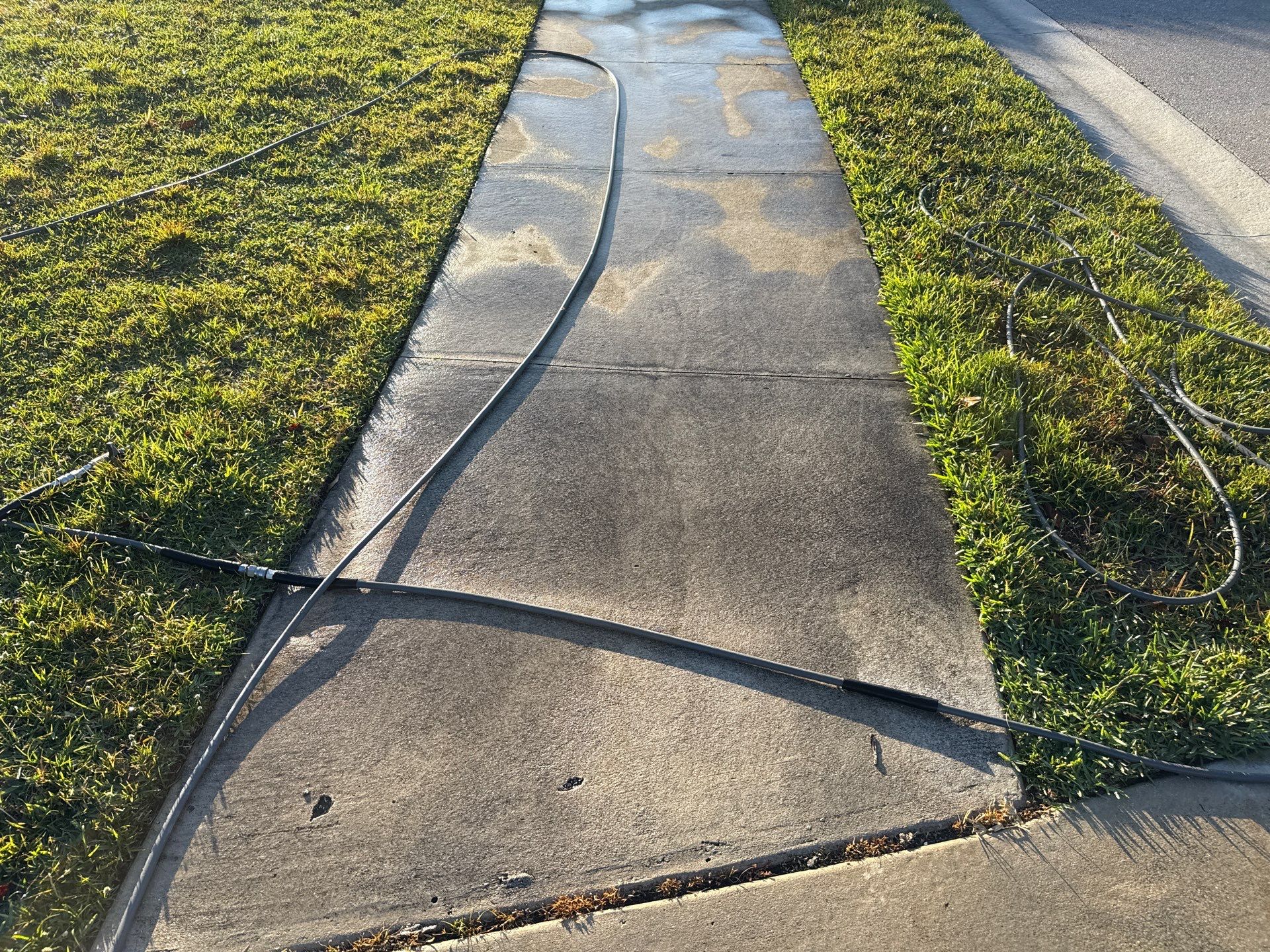 Oil Stain Removal & Concrete Cleaning – The Heights Community, Bradenton, FL by Sunshine AquaWash