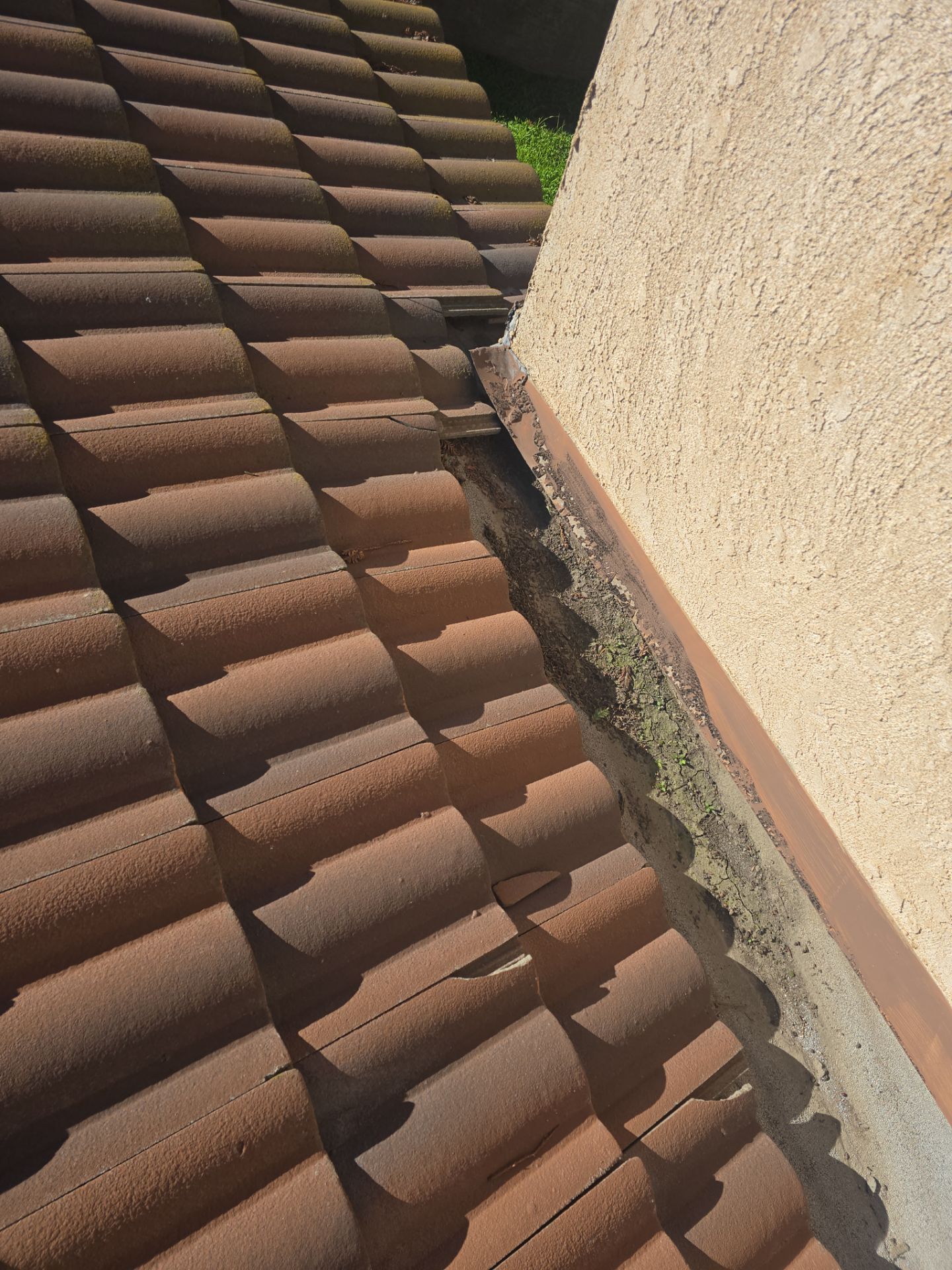 Tile Roof repair by Grandmark Service Company