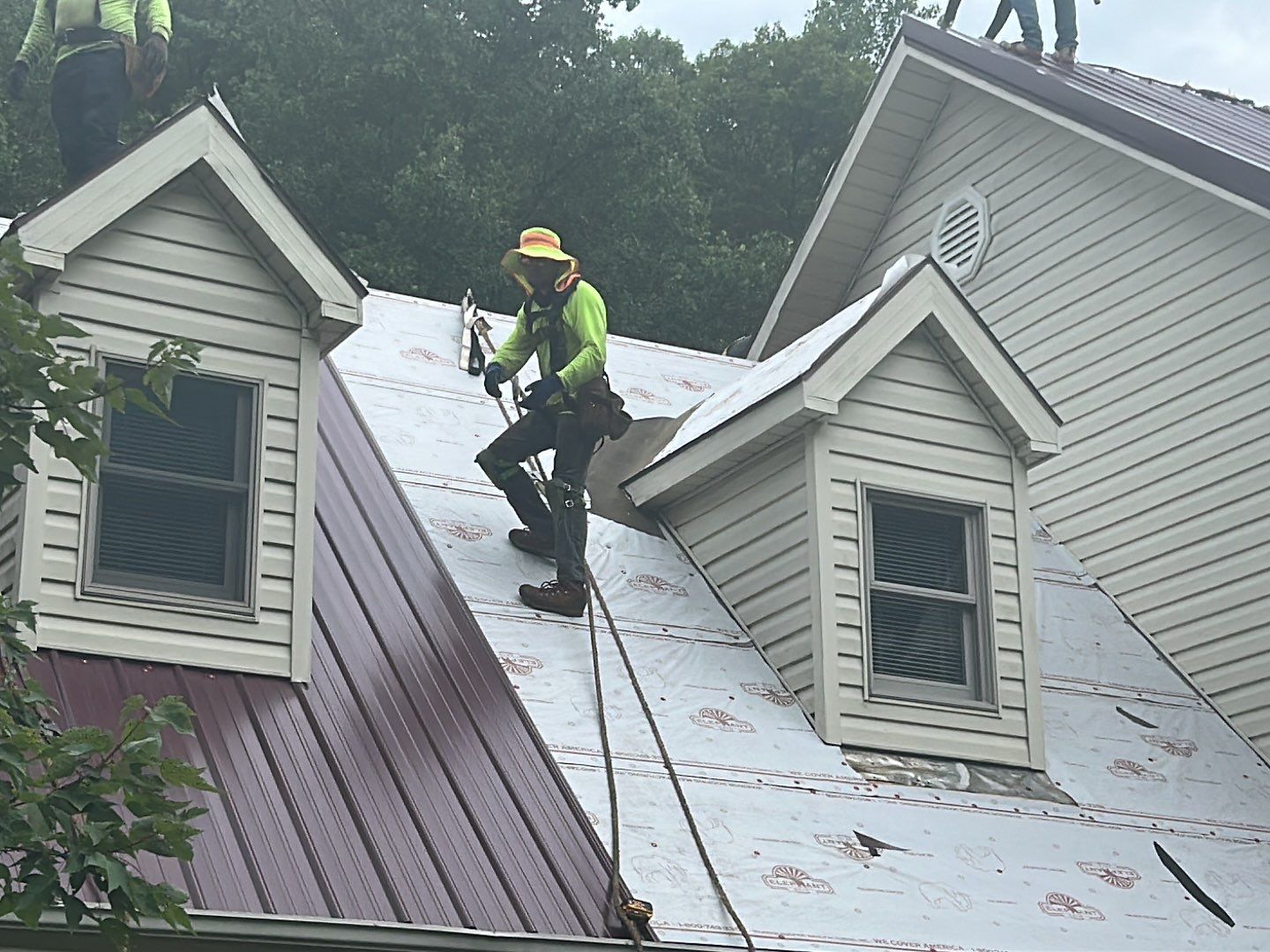 Residential Roofing Installation using Metal by Mr. Roofer