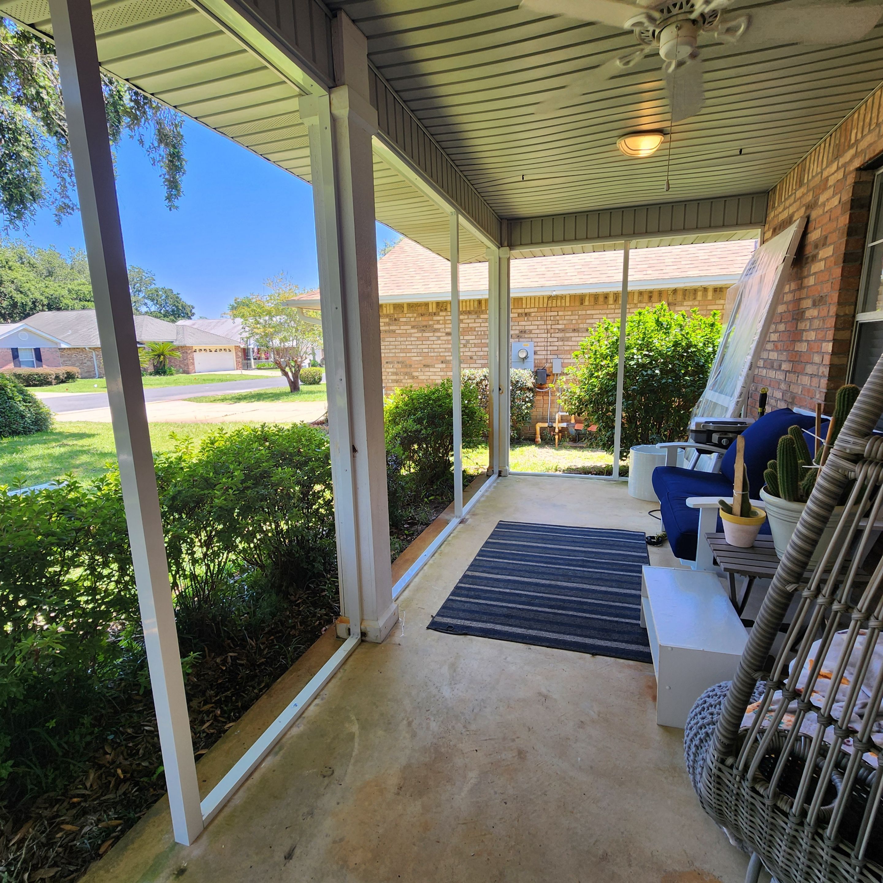 Screen Under Existing Patio Cover by Titan Sunrooms