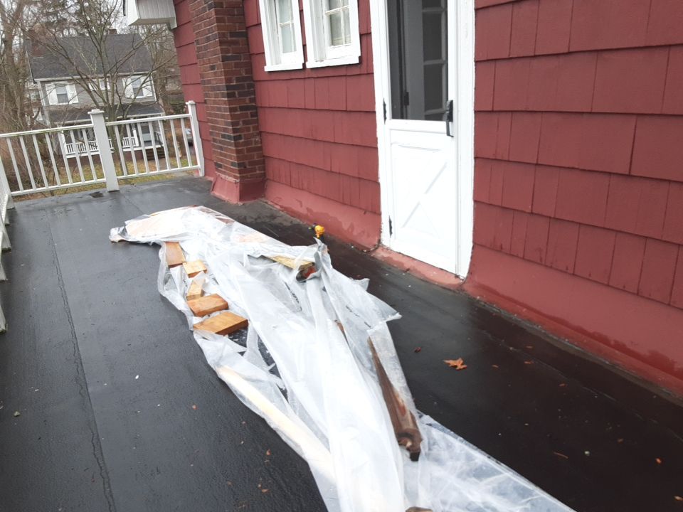 Residential Roof Replacement using Patio Roof by Absolute Roofing and Construction