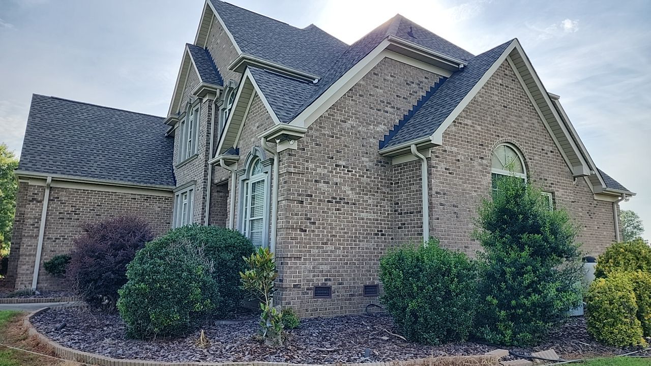 House Wash using cleaner by Power Wash Masters LLC
