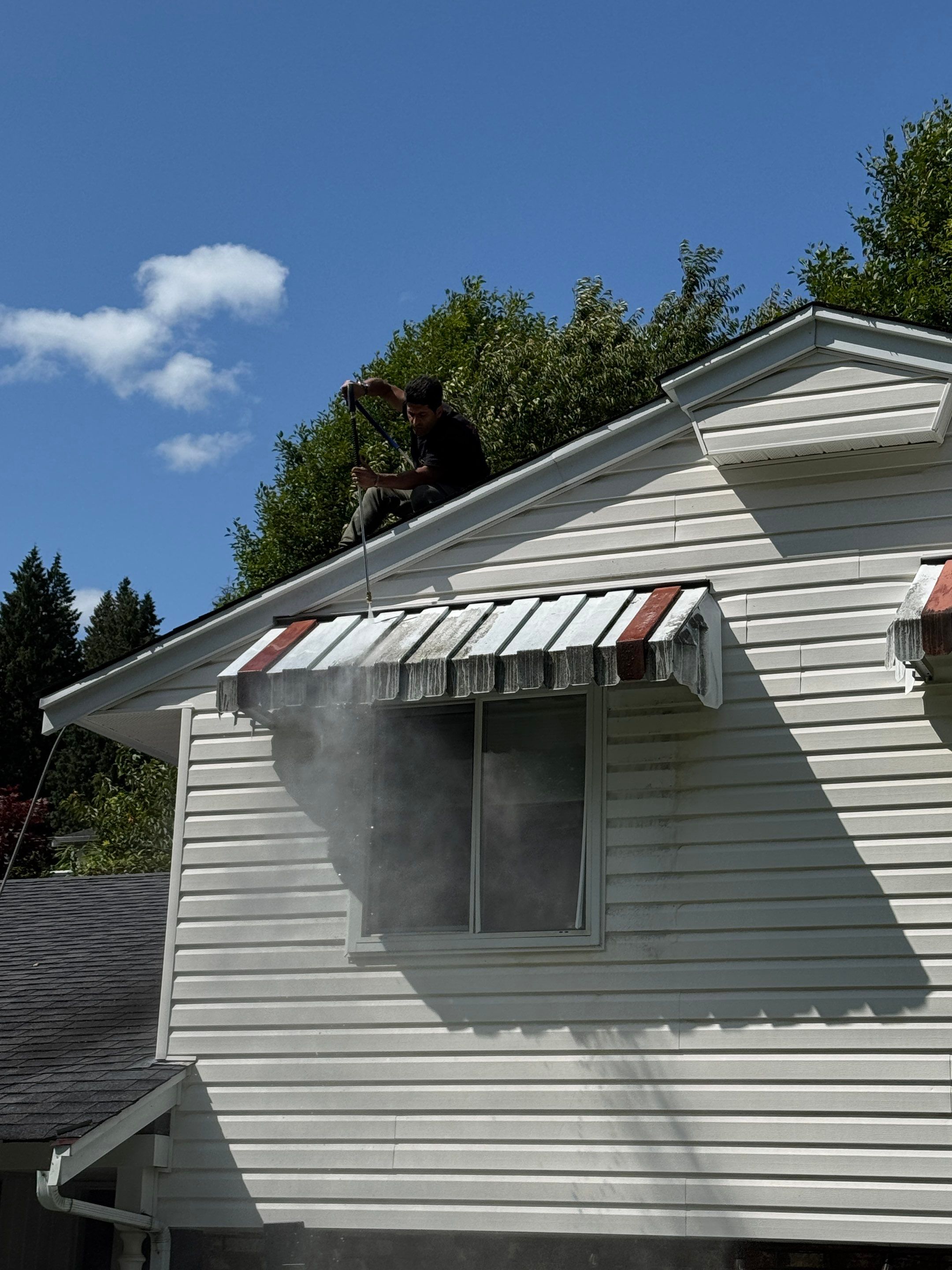 Repair Damaged Gutter & Power Wash House Siding by YVR Construction Group