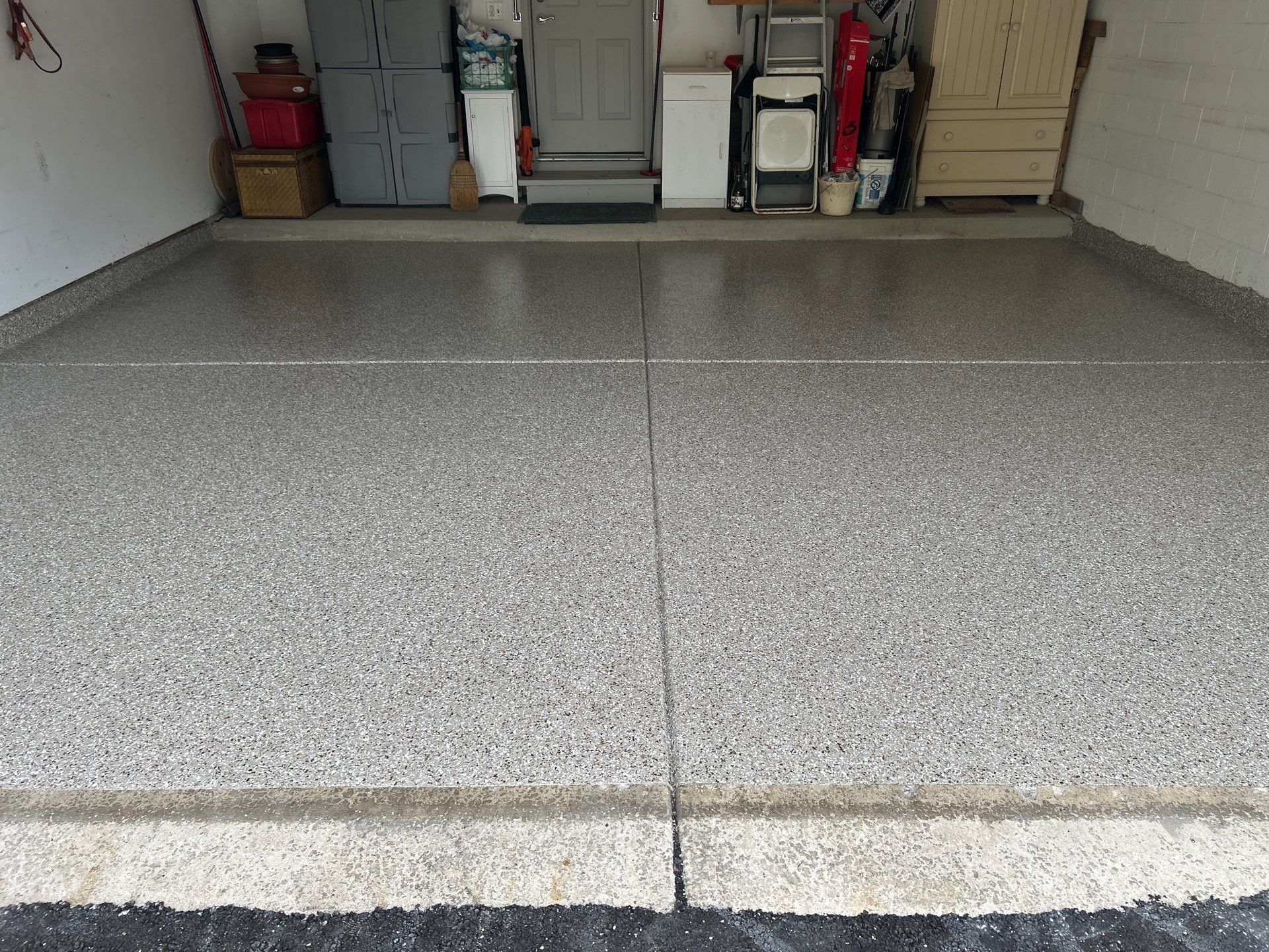 Pebble Beach Coating in LaPorte! by Innovative Spaces / Innovative Concrete Coatings