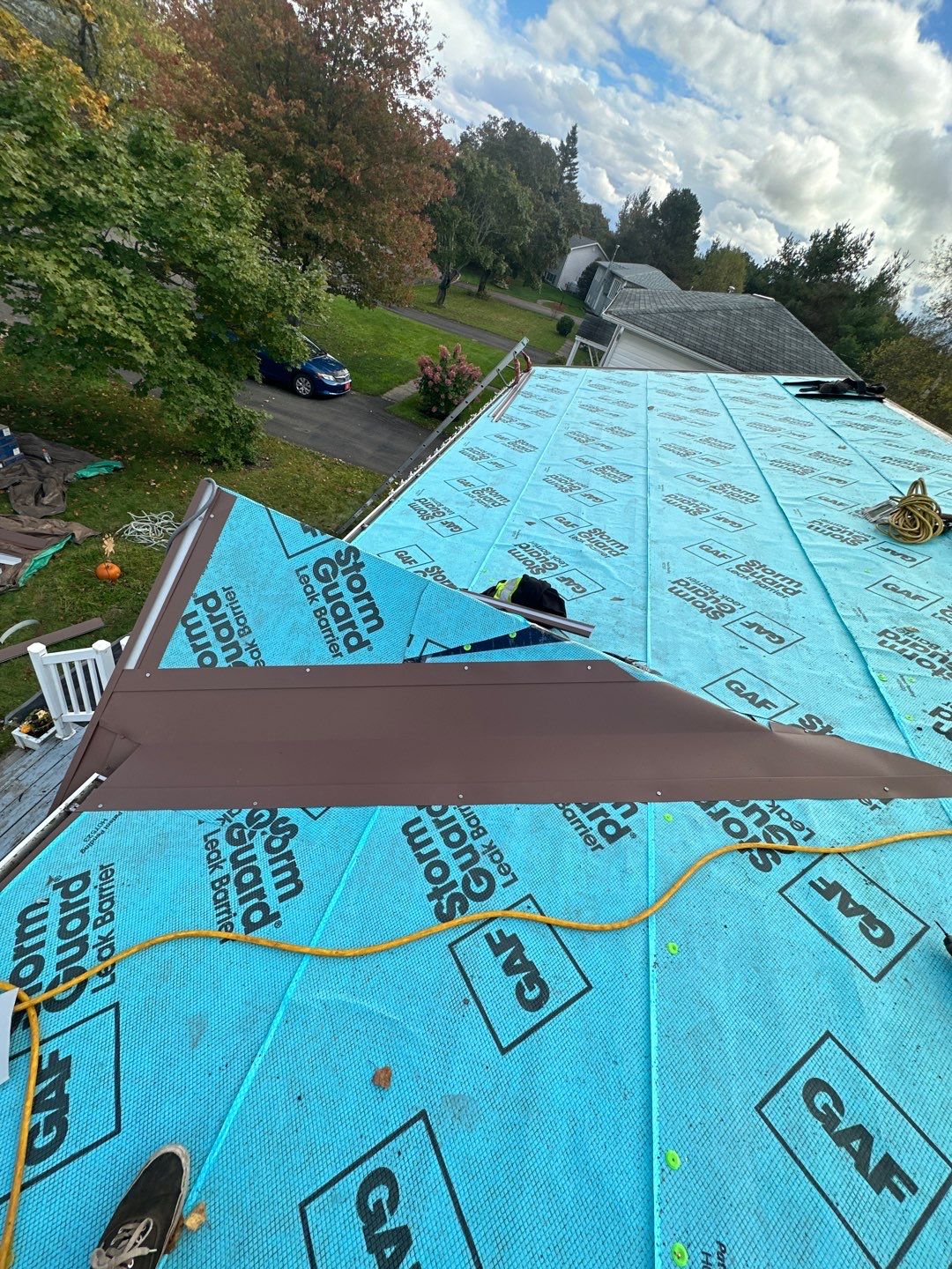 Residential Roofing Installation using Wakefield Bridge Steel Shingle by Ideal Steel by Artisan Roofing & Home Improvements Inc.