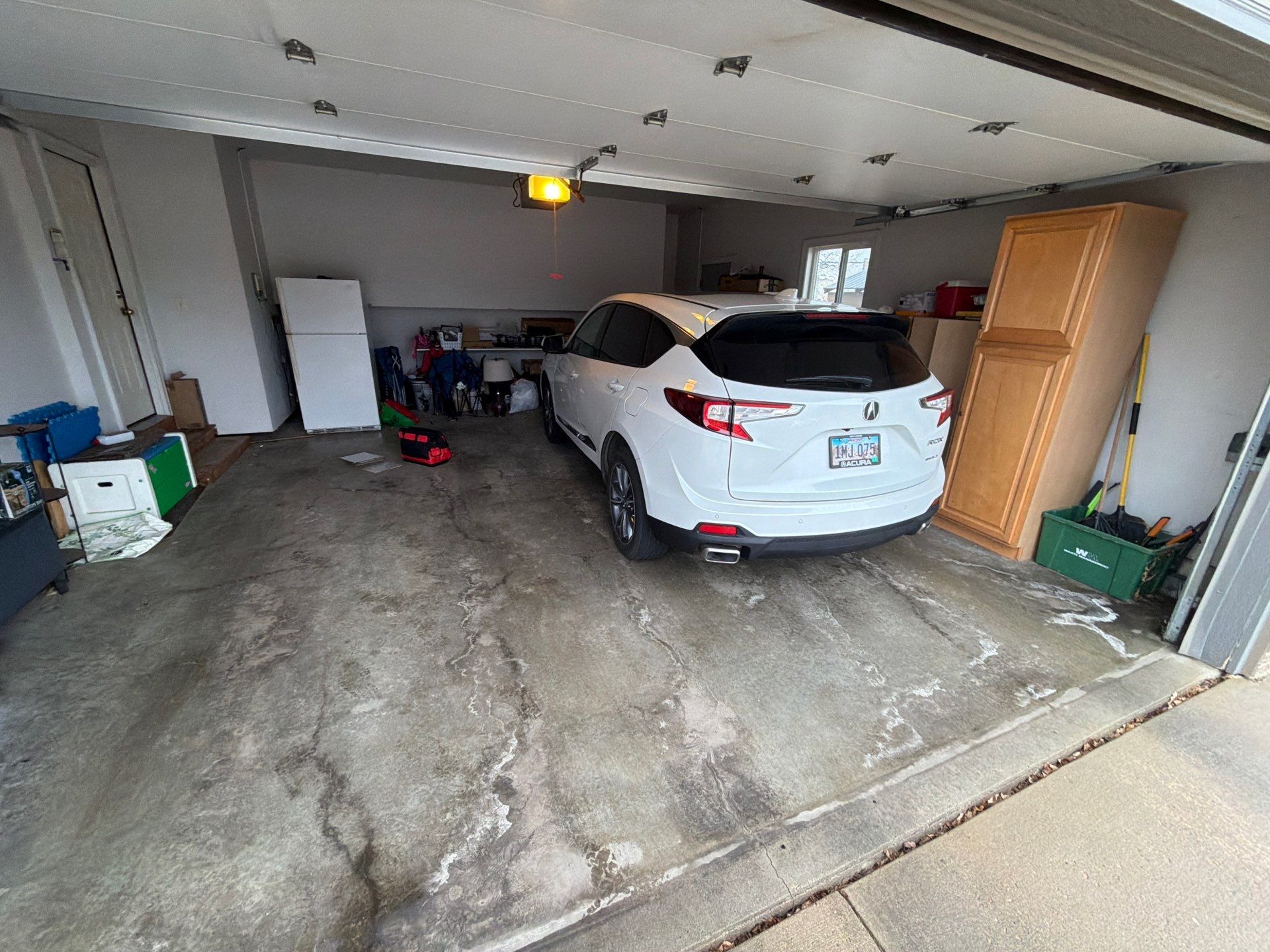 Decorative Chip Epoxy Garage Floor Coating in Sioux Falls by Select Painting, Coatings & Garage Cabinets