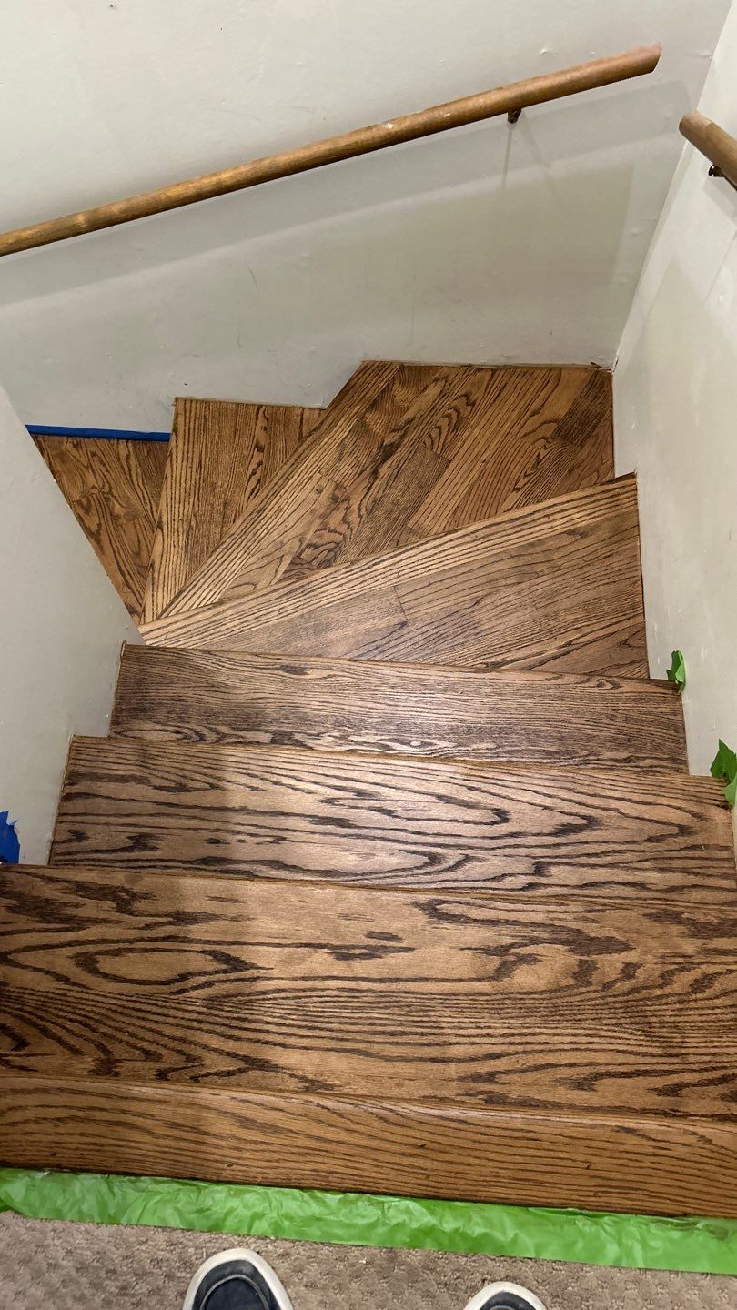 Parquet floor and stair treads by Footprints Floors of Nashville