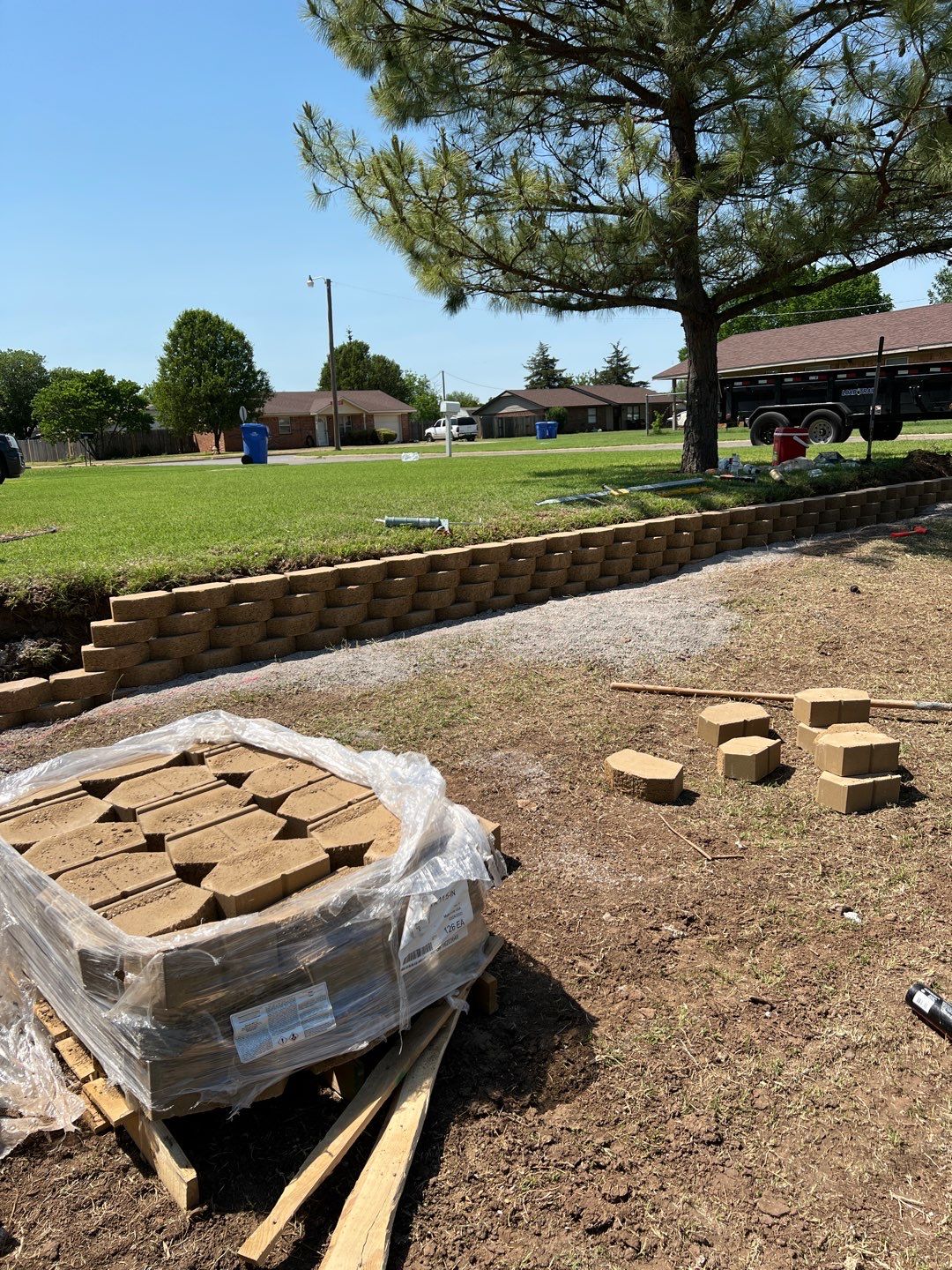 Retaining Wall using Rocks by Clays Services Inc