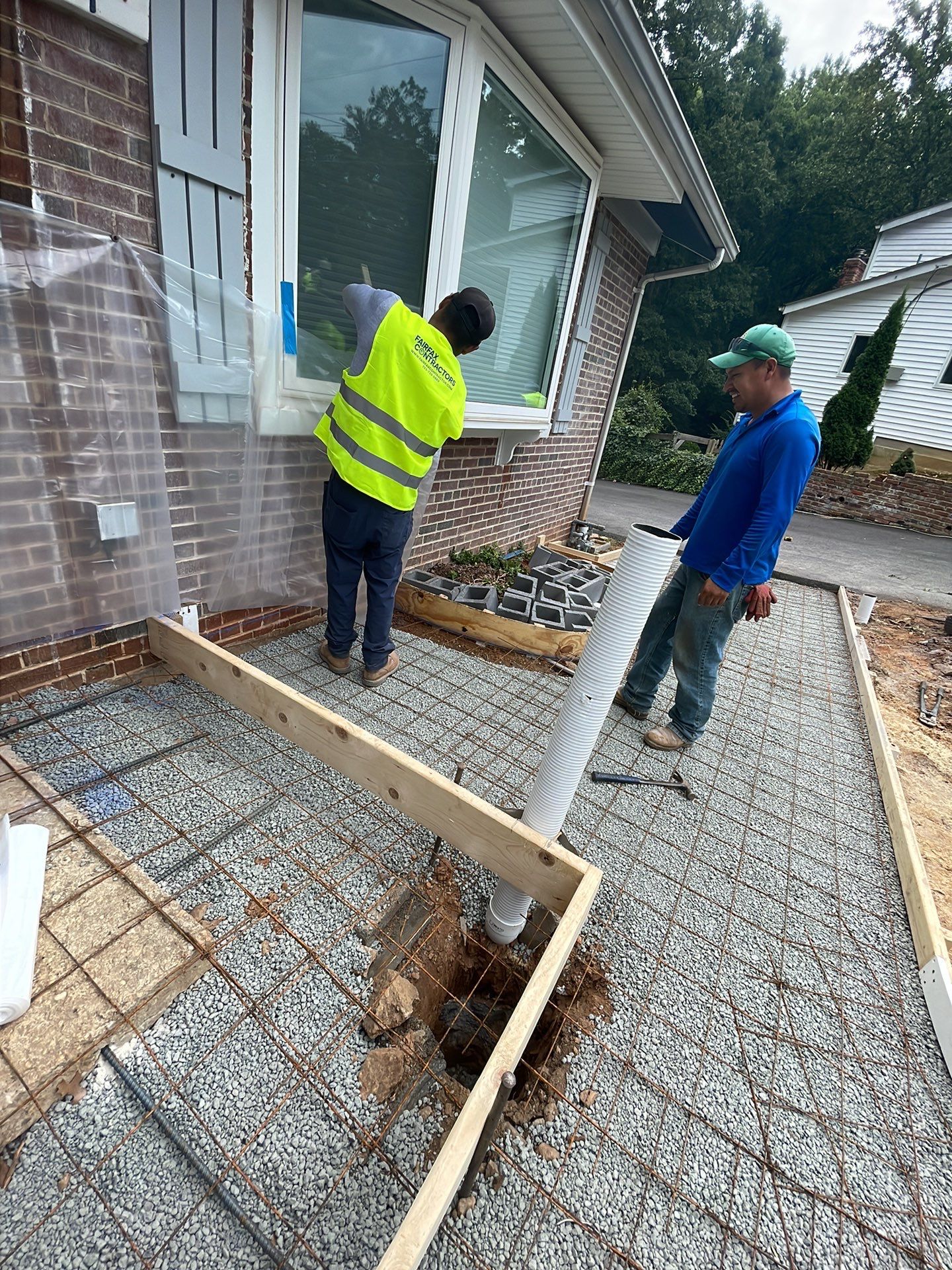 New walkway with stairs and a new front porch by Fairfax Contractors, LLC