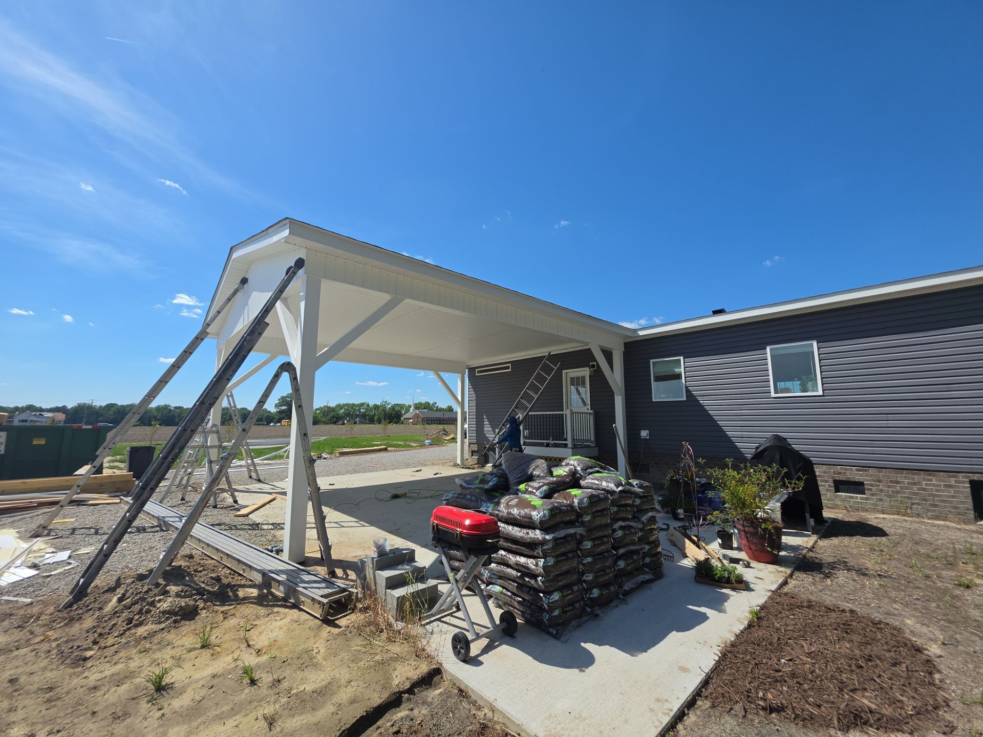 Custom Trex Covered Deck and Gabled Roof in Winterville by The Remodeling Company