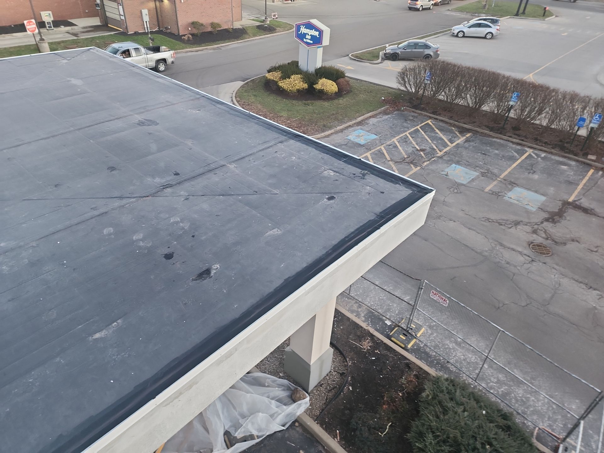 Commercial Roofing Installation using 60 mil rubber roof  by Nitro Roofing and Construction