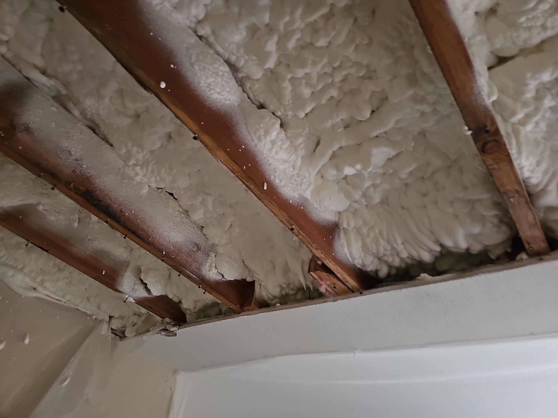 Attic Insulation using open cell spray foam by NYS Foam & Energy