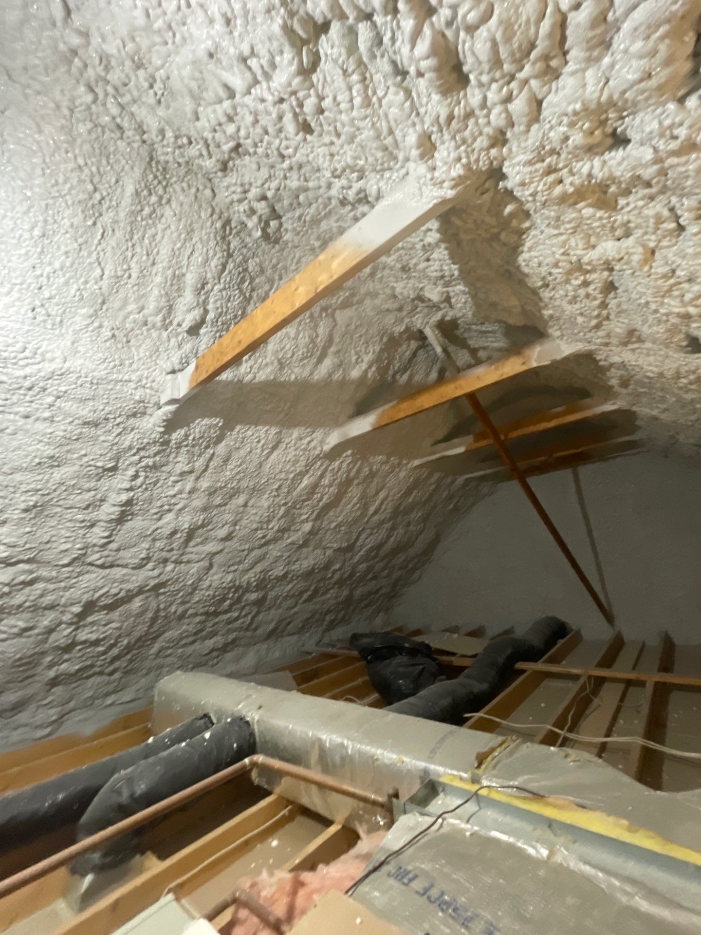 Attic Insulation using open cell spray foam by NYS Foam & Energy