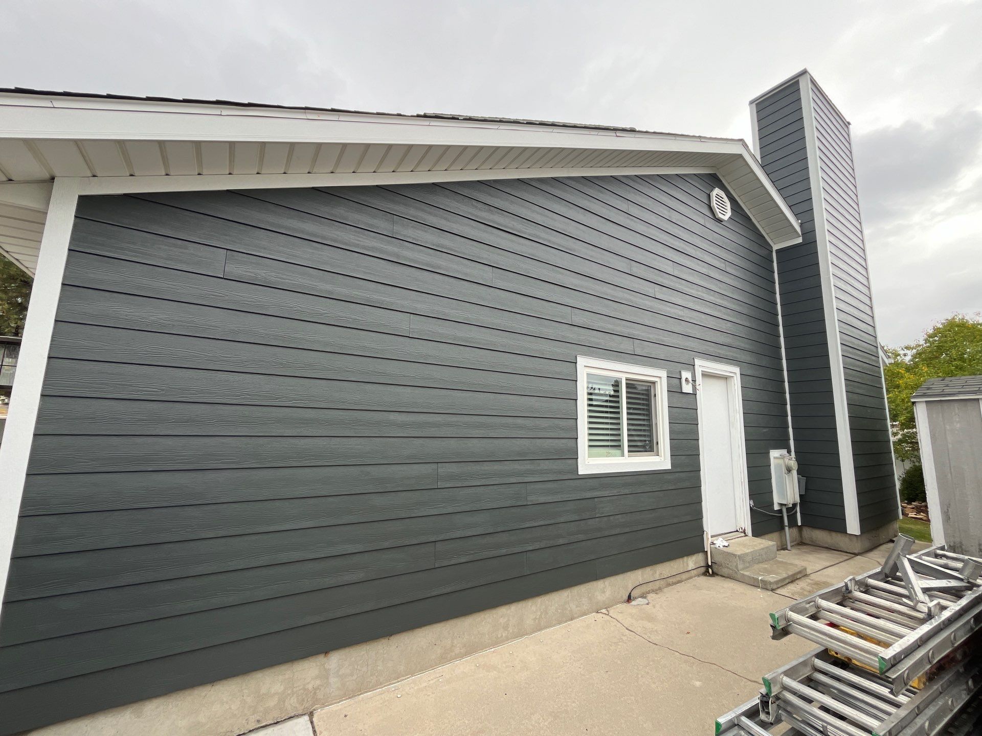 Sandy | Expansive Hardie Upgrade with Custom Accents | Iron Gray by Ideal Siding Utah
