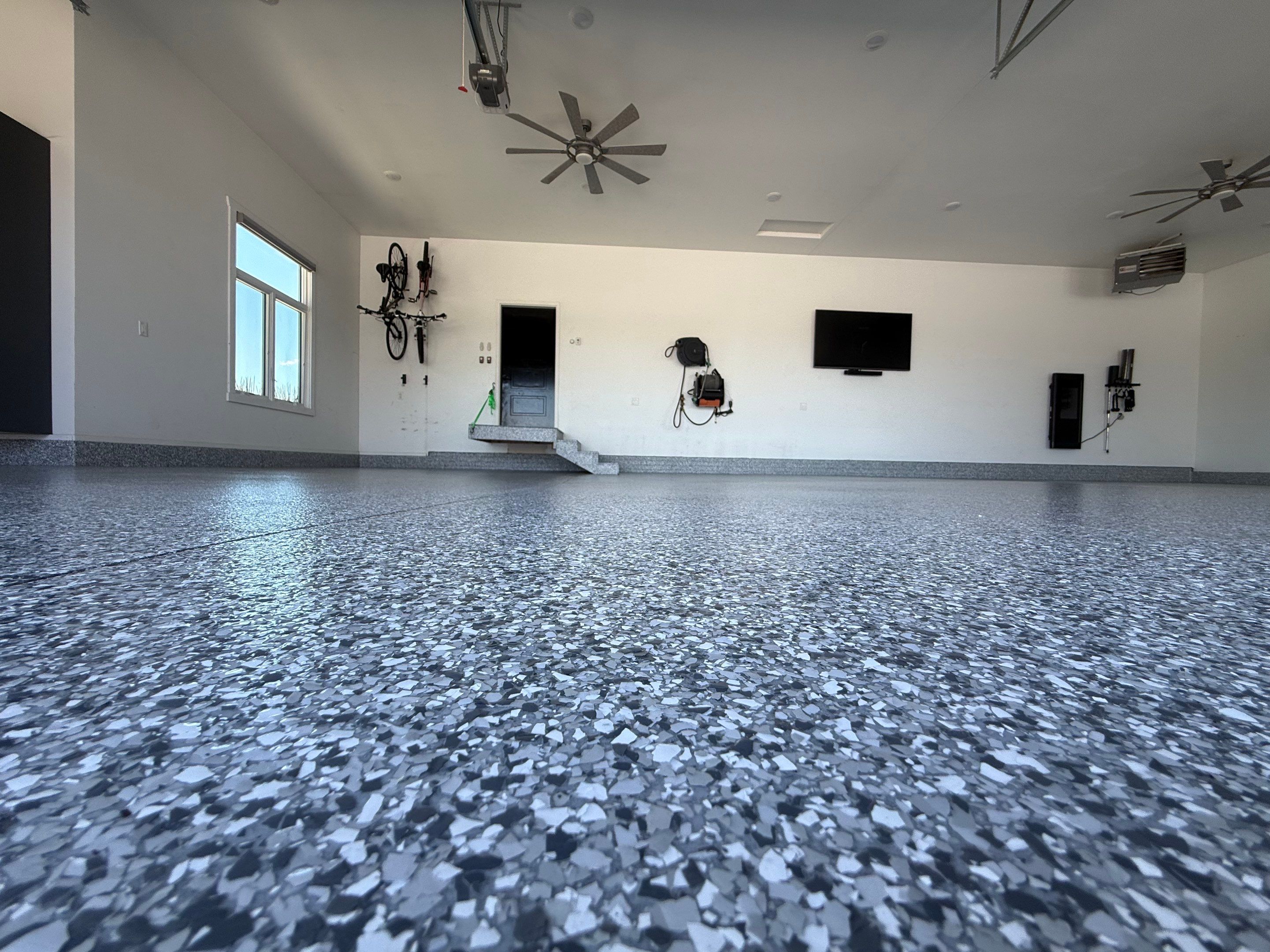 Gravel Flake Garage Floor Coating in Yankton by Select Painting, Coatings & Garage Cabinets