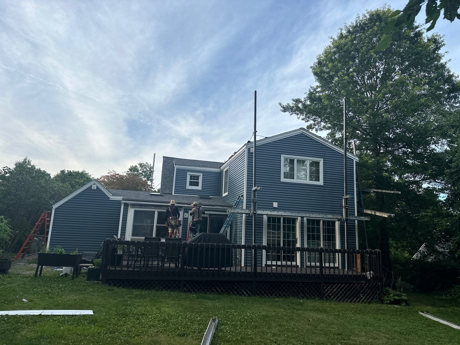 Complete Exterior Estate gray with Pacific Blue Siding by A Plus Exterior