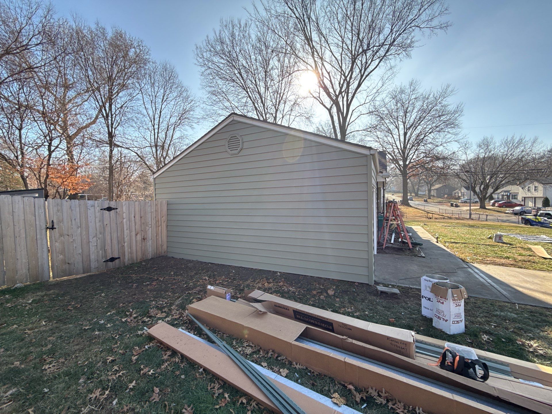 A whole new look for this Gladstone Home  by EEC  Windows, Siding & Roofing 