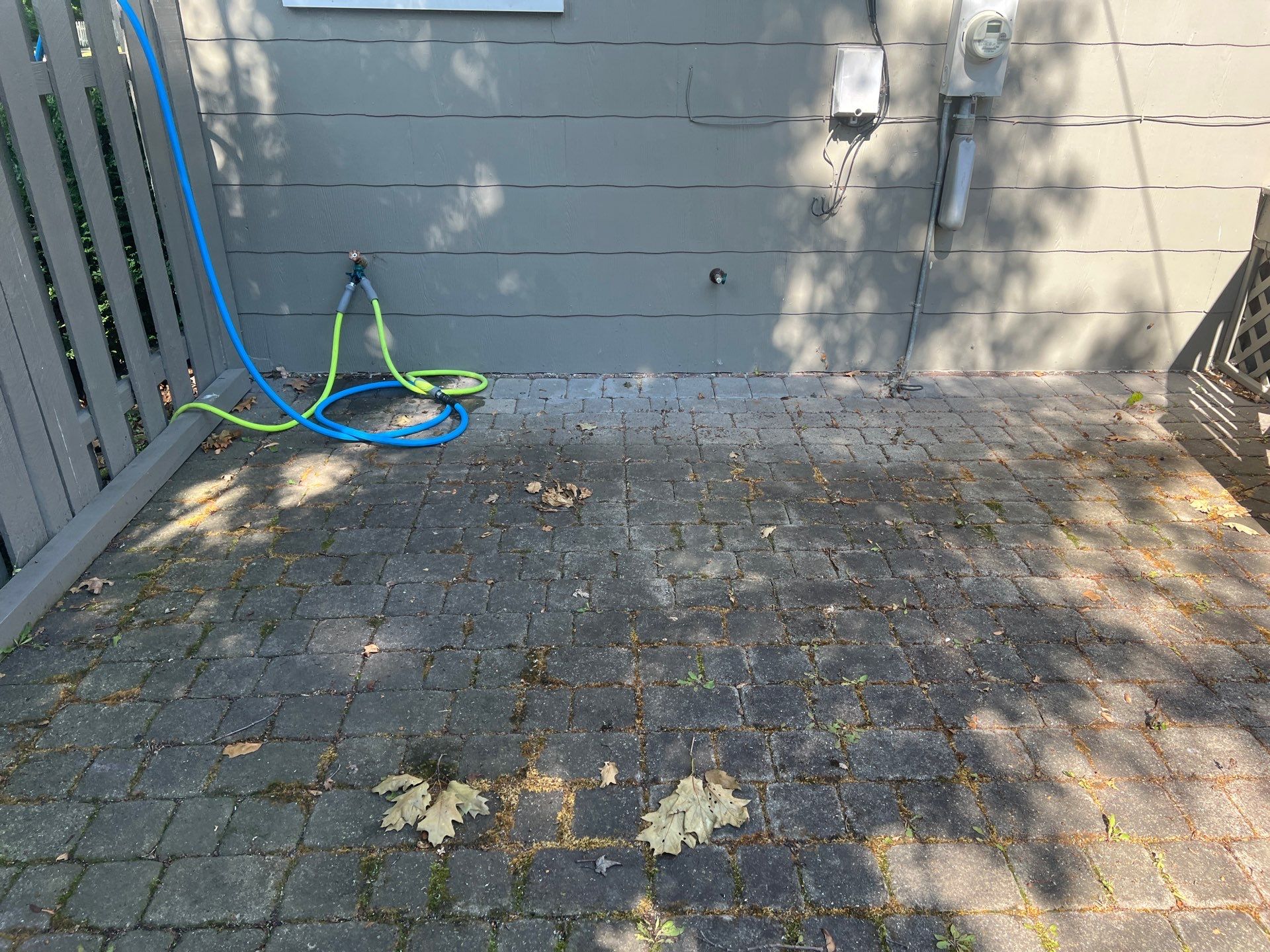 Brick paver cleaning and sealing by Northern Power Washing LLC.