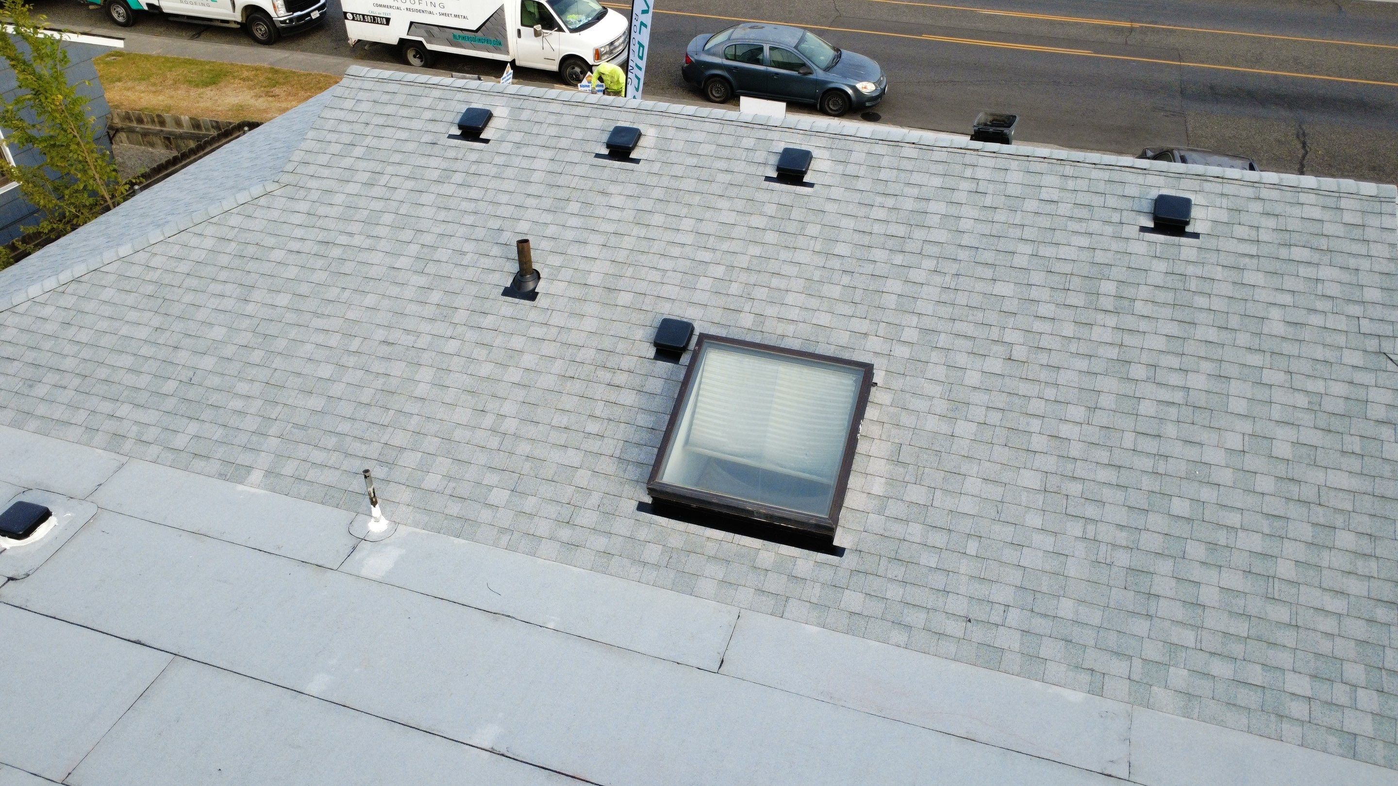 Residential Shingle and Flat Roof Replacement with Fascia Restoration in Kennewick by Alpine Roofing