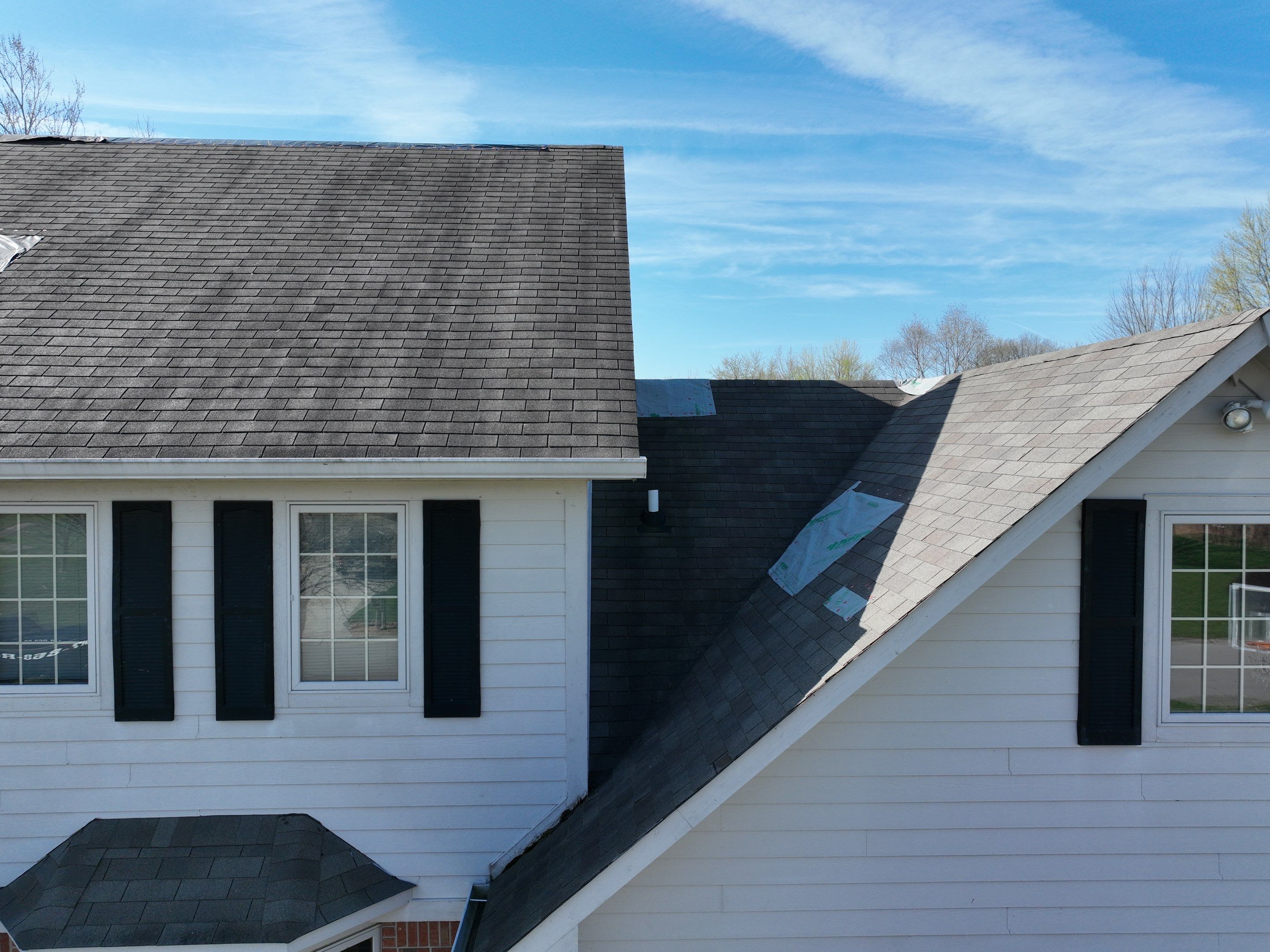 Tornado damage in Whiteland. Roof replacement, James Hardie siding, exterior paint, gutters, windows, doors by 317 Roofing & Restorations