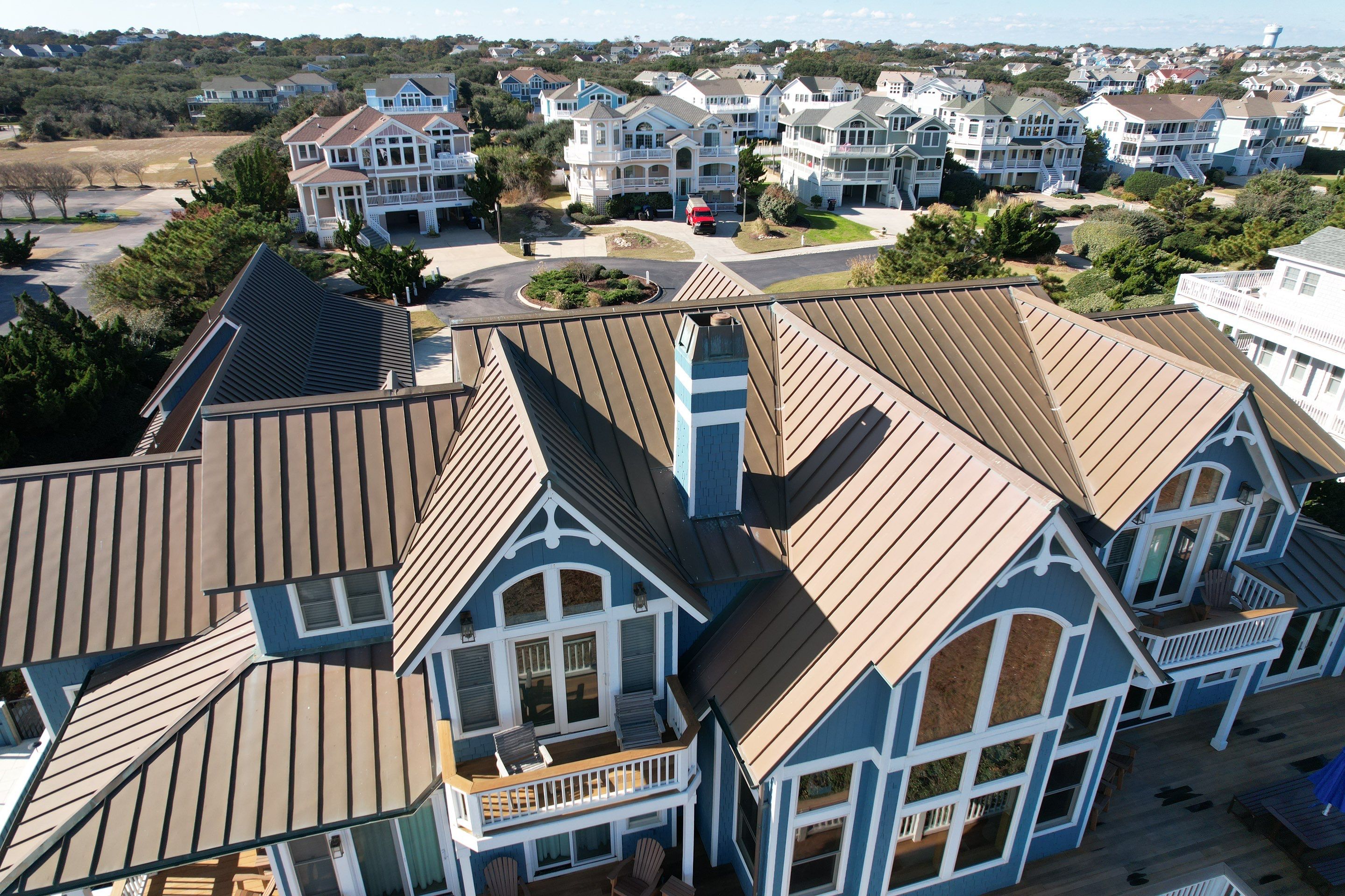 Large Metal Roof Transformation by Gallop Roofing & Remodeling, Inc.