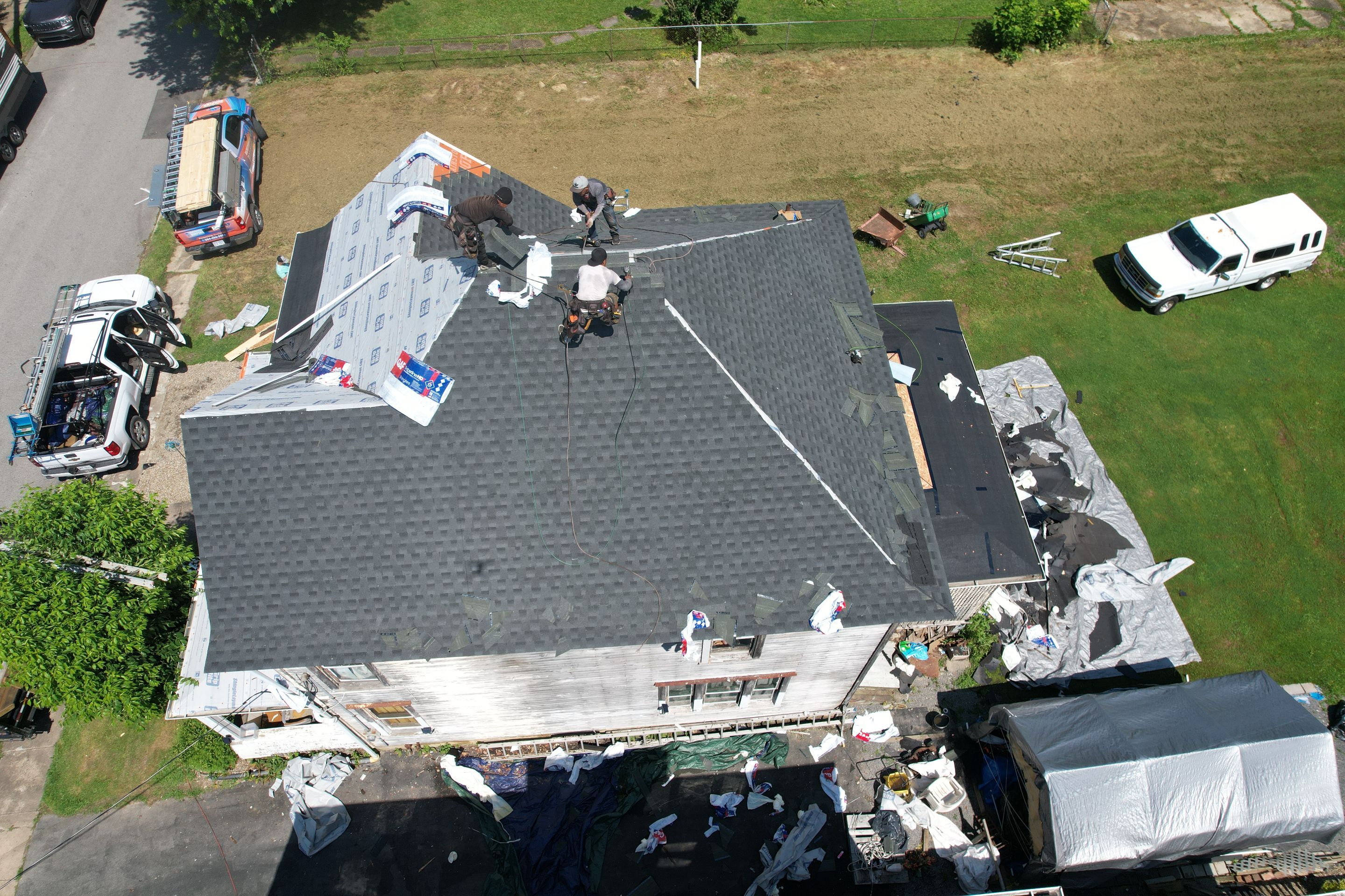 Residential Roofing Installation using GAF Timberline HDZ Charcoal by Rainstoppers Roofing