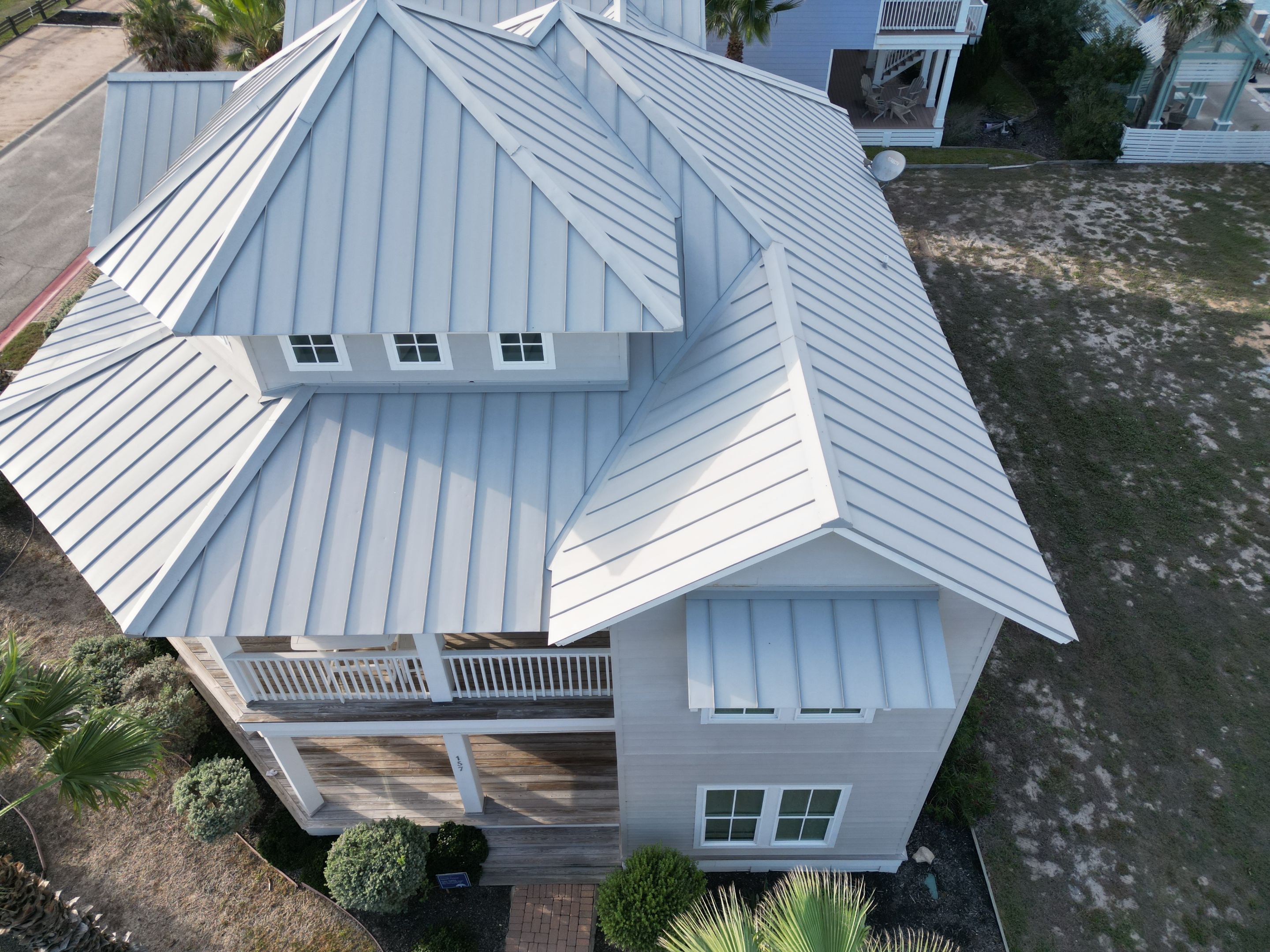 Residential Roof Replacement using 24 GA Double-Lock - Match Dove Grey by Action Exteriors Austin