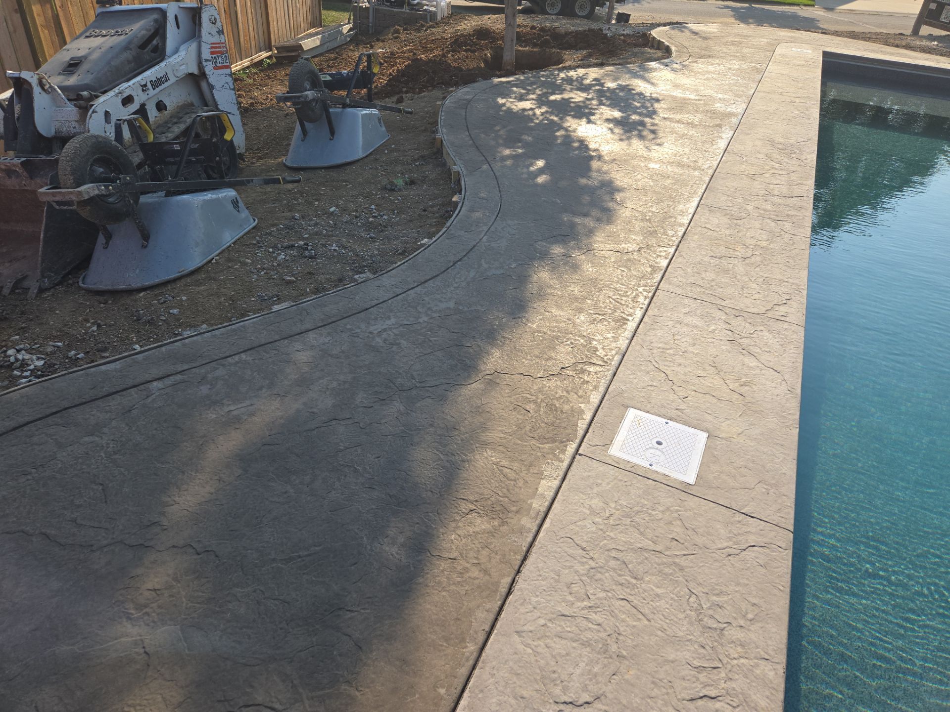 Back Yard Pool Patio by LAND ESCAPES LLC
