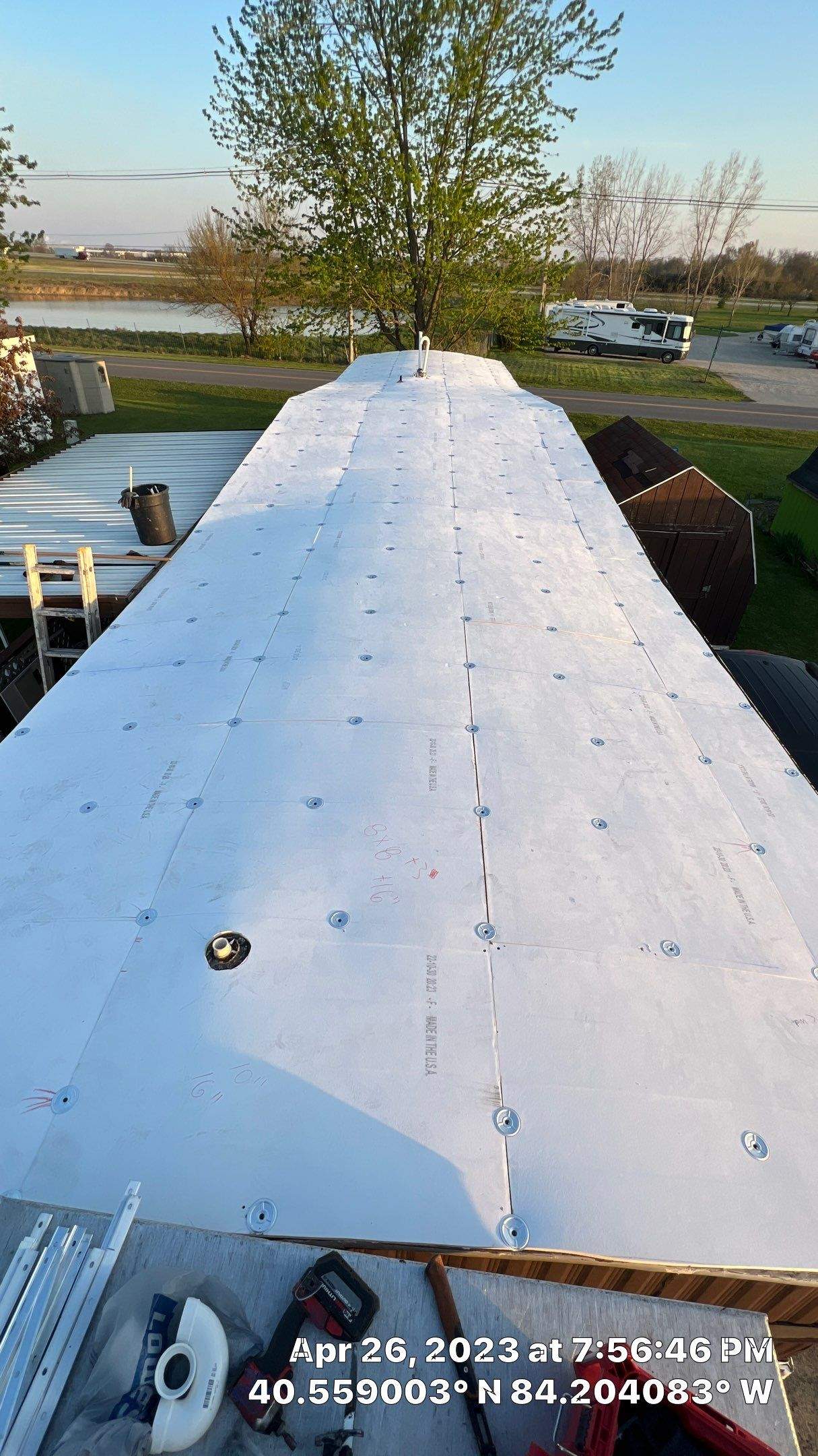 Residential Roofing Installation using 60 mil rubber roof  by Nitro Roofing and Construction