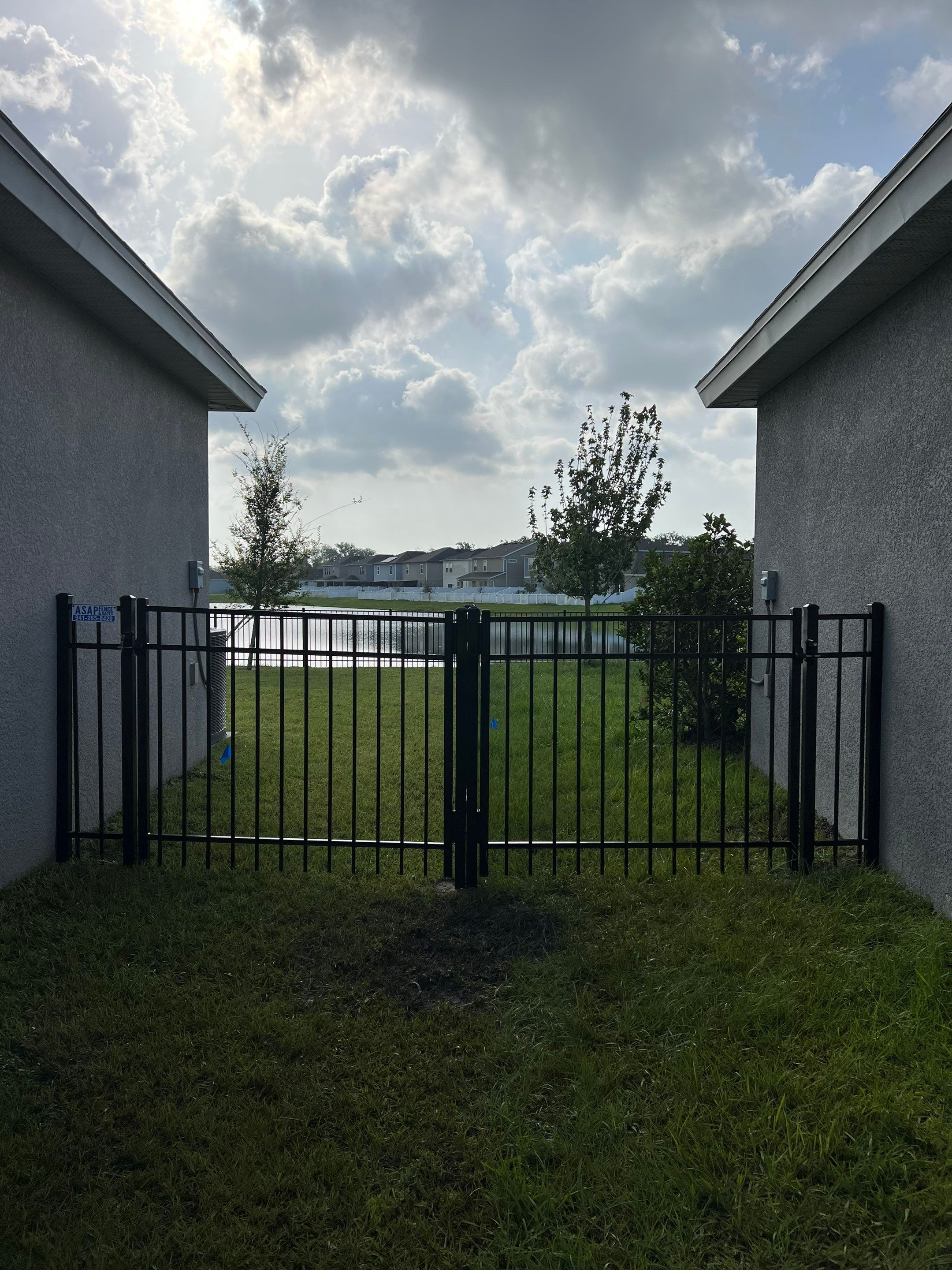 Aluminum Fence Installation using Black 3 Rail Aluminum Fence by Asap fence and gates, LLC