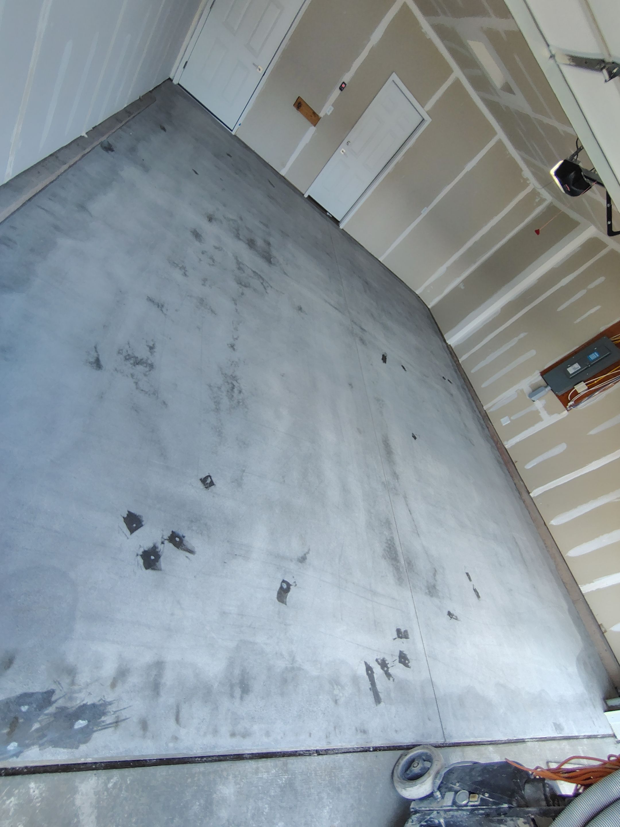 Custom Epoxy Garage Floor and Patio Coating in Sioux Falls by Select Painting, Coatings & Garage Cabinets