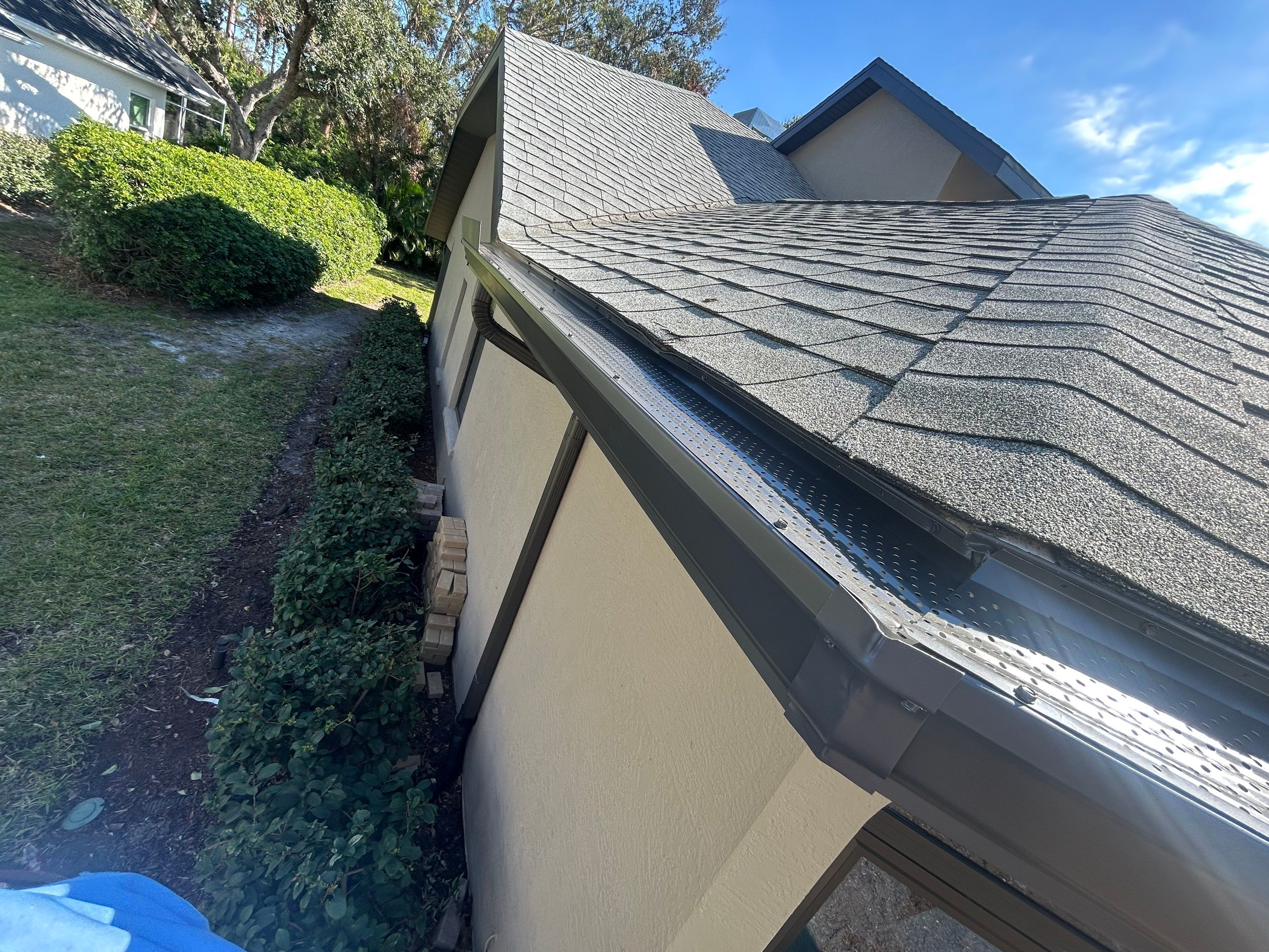 Black Seamless Gutters in Sarasota FL by Gutter Professors