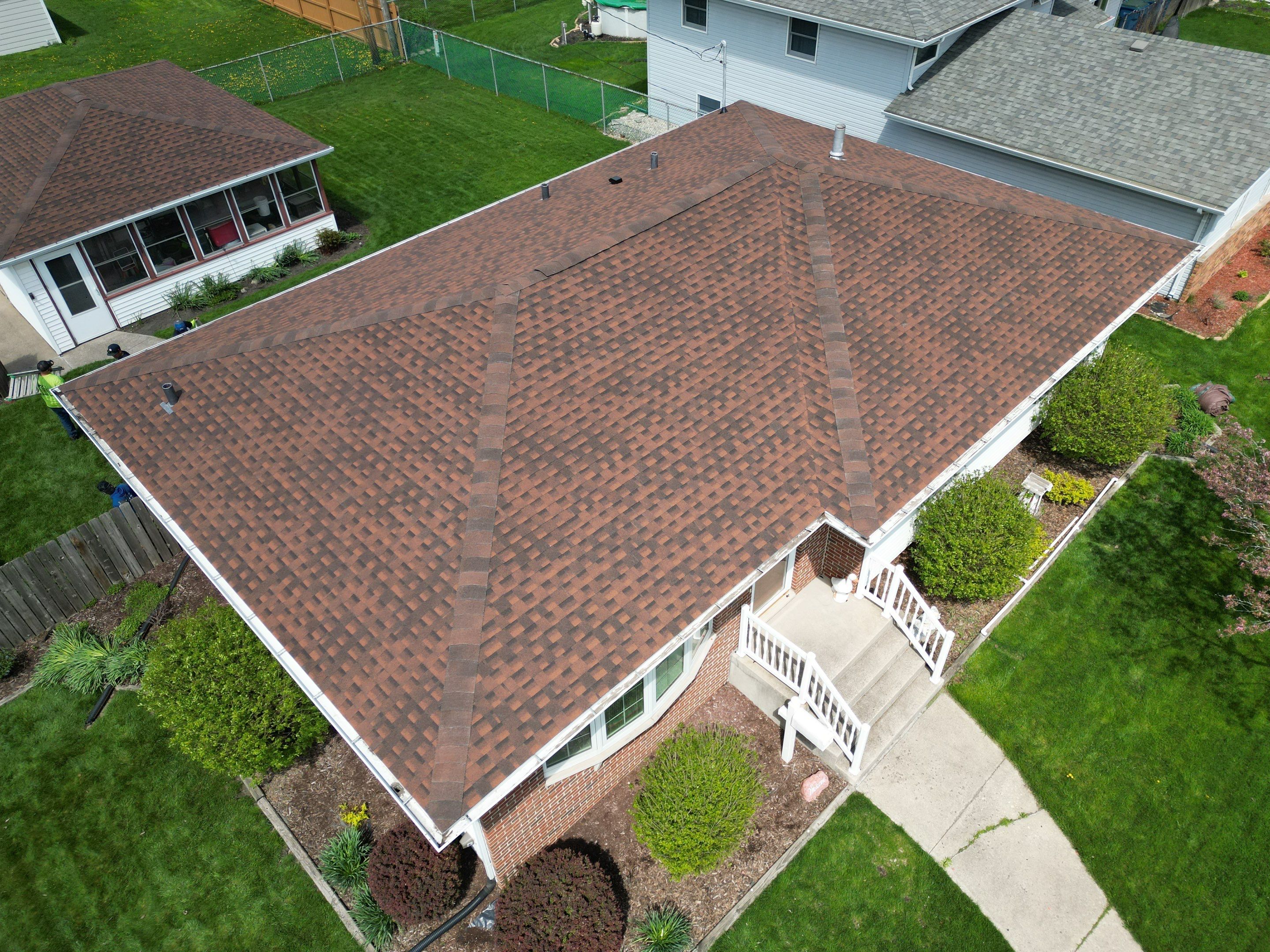 House and garage roof replacement by Optimal Home Improvement 