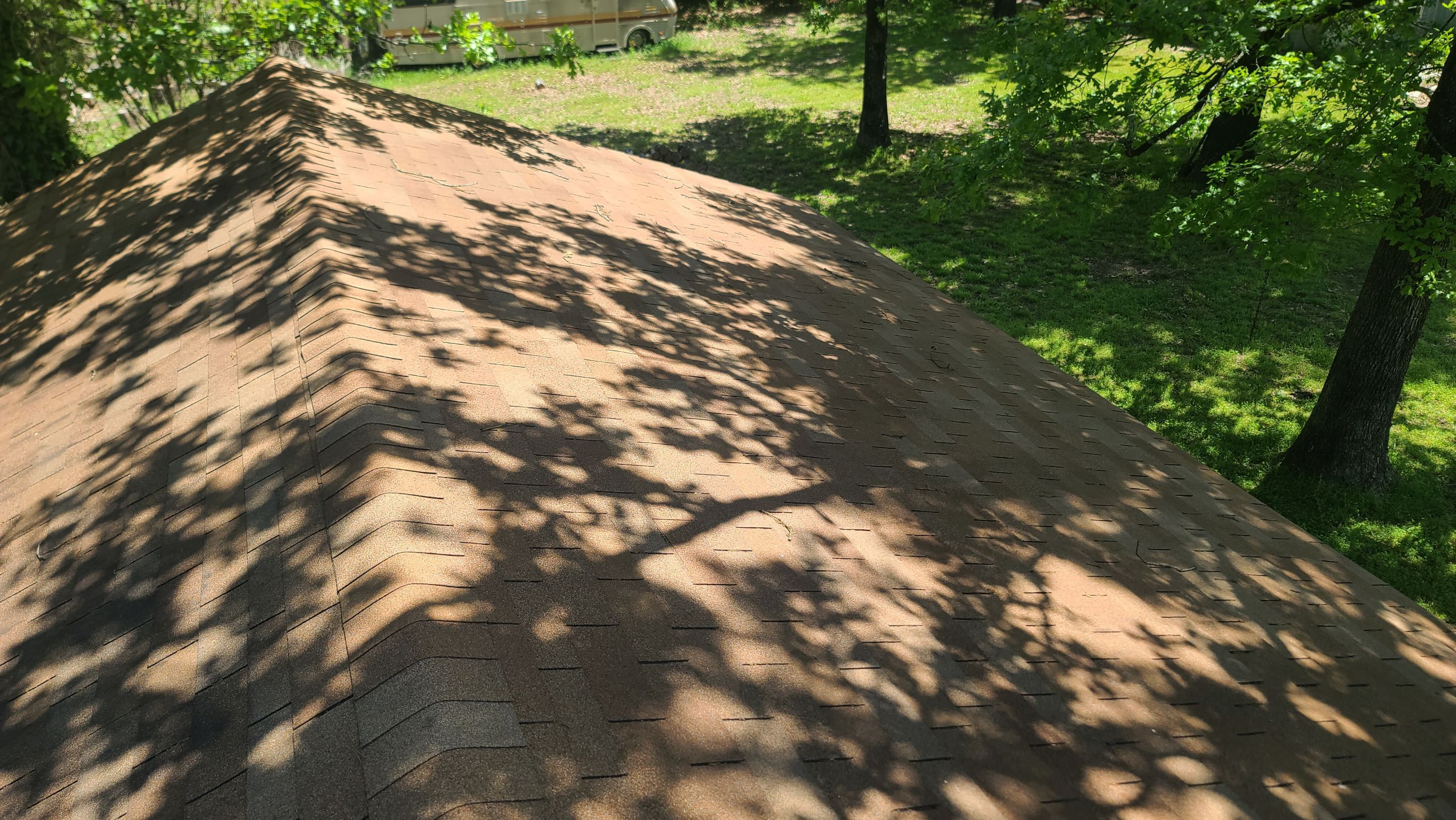 Storm Restoration Reroof: 25 Year 3-Tab Shingle by Hostetler Roofing