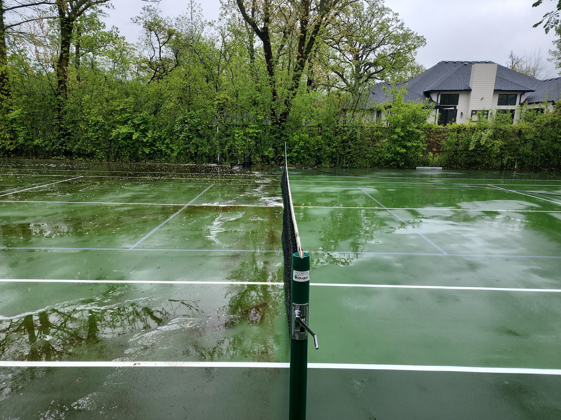 Tennis Court using Algaecide, soft wash soap by Northern Power Washing LLC.