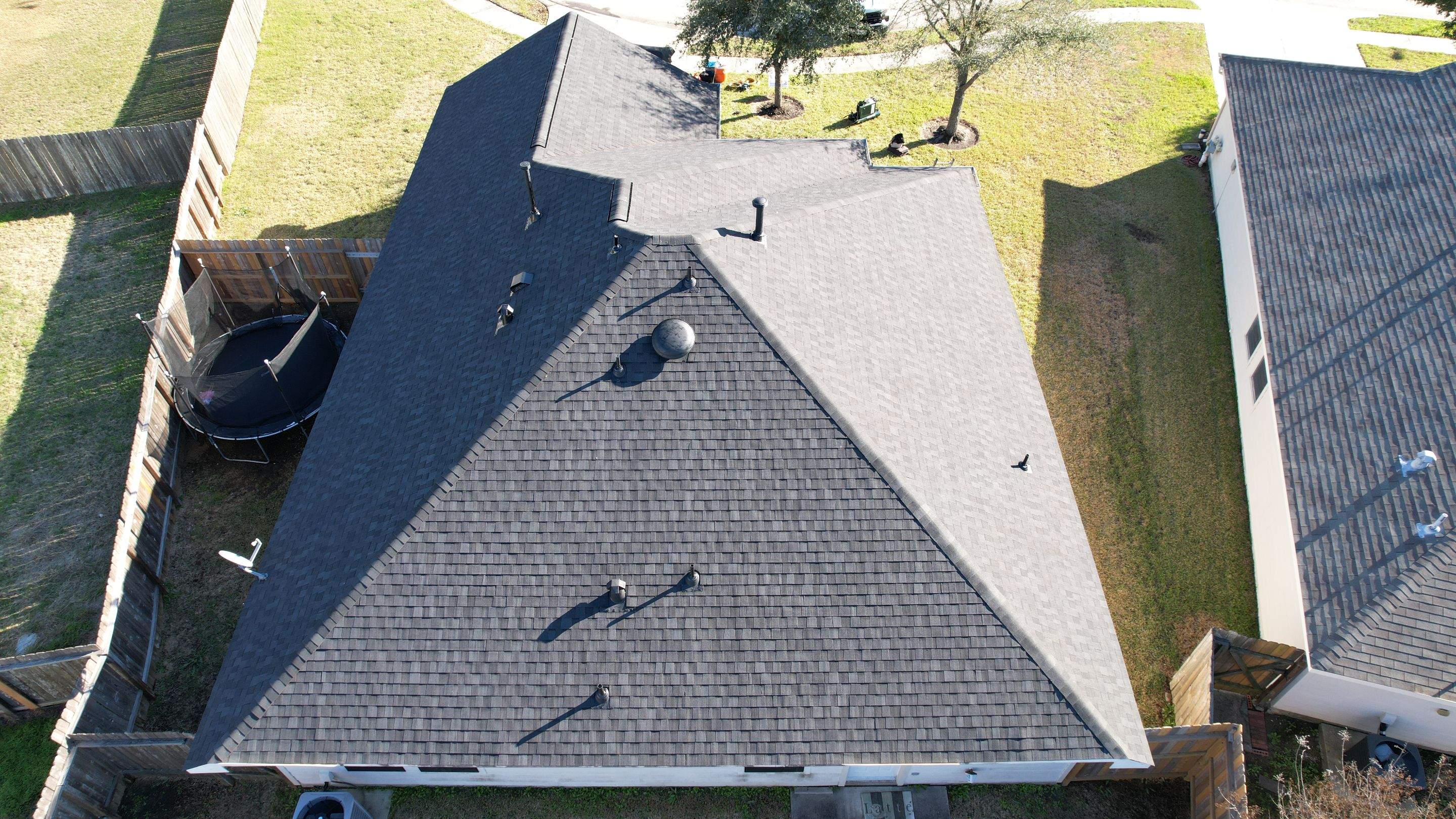Charcoal Hip-Roof Replacement — Humble, TX by PL Roofing & SB Roofing, LLC.
