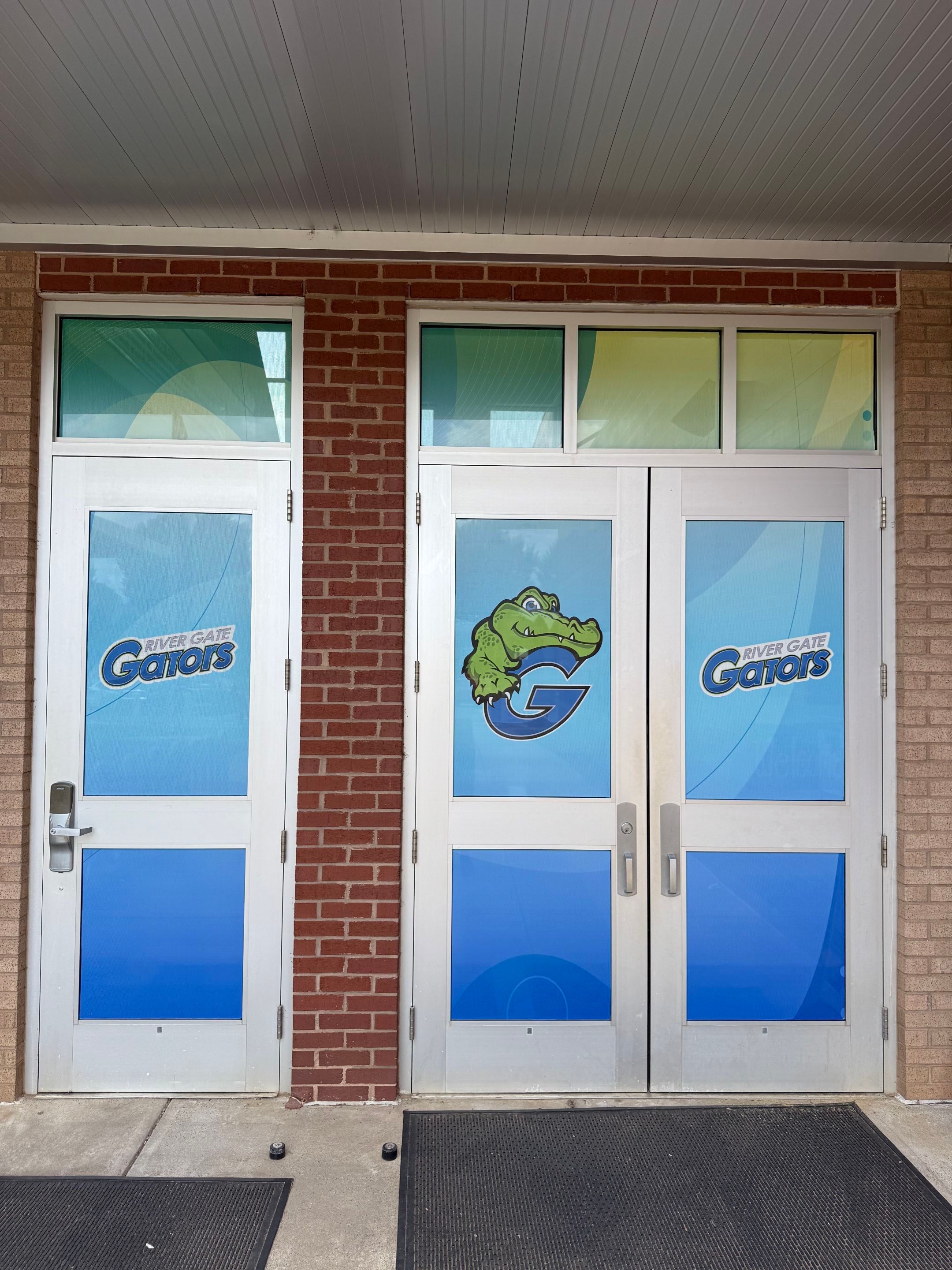 Rivergate Elementary - Window Safety Film Installation with Custom Graphics by QC Signs and Graphics