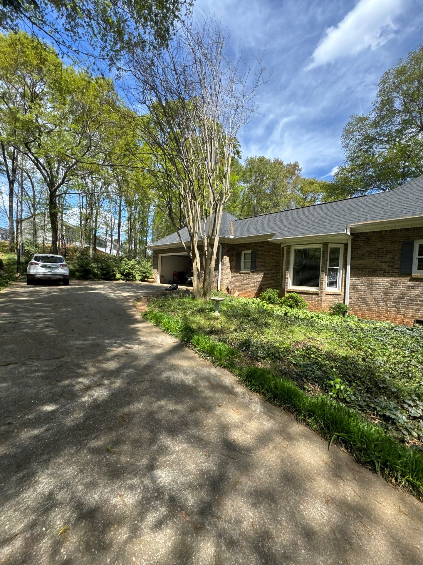 Spartanburg Residential Roof Replacement with Architectural Shingles and Skylights by Roofers LLC