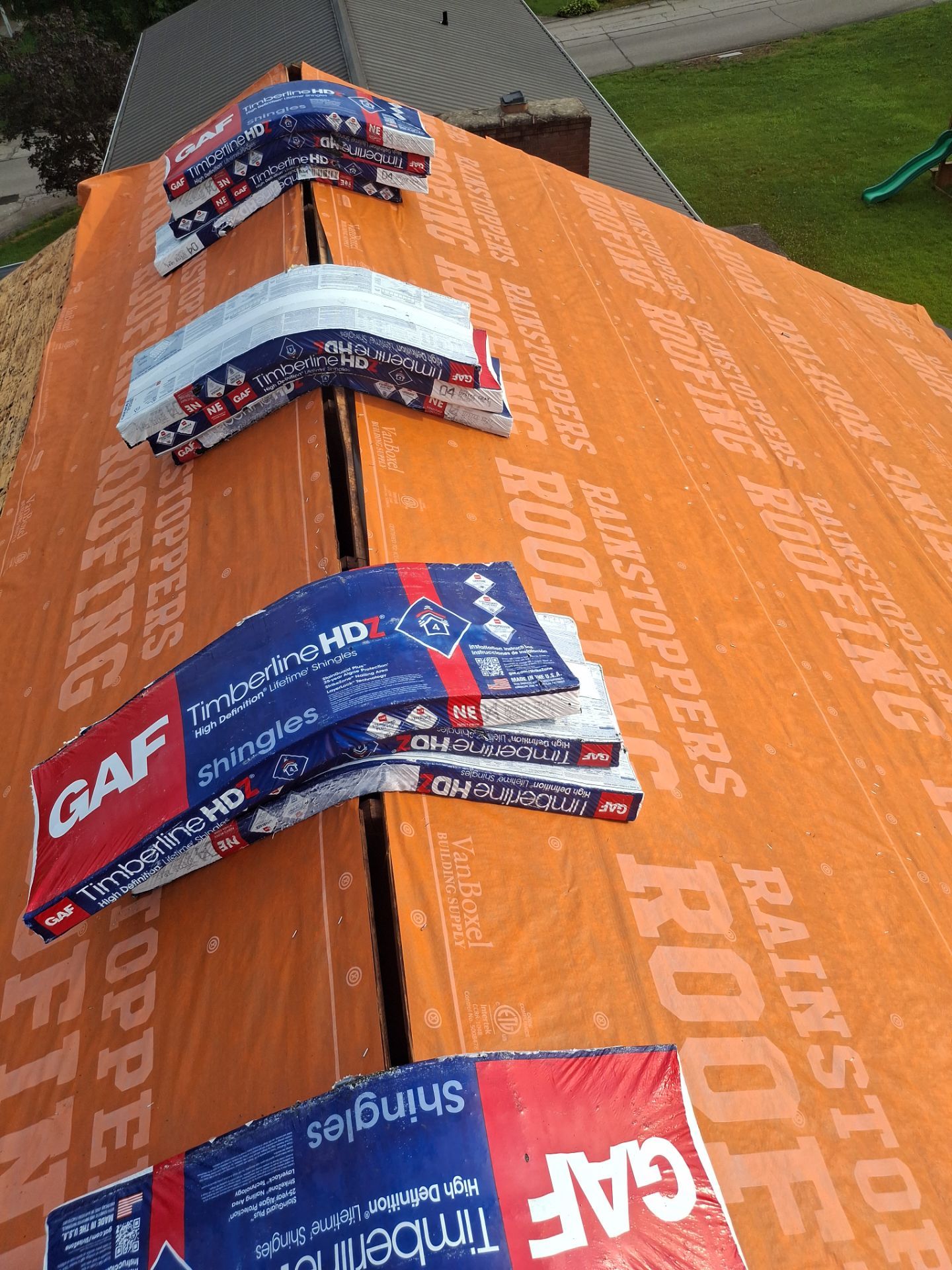 Residential Roofing Installation using GAF Timberline HDZ Oyster Grey by Rainstoppers Roofing