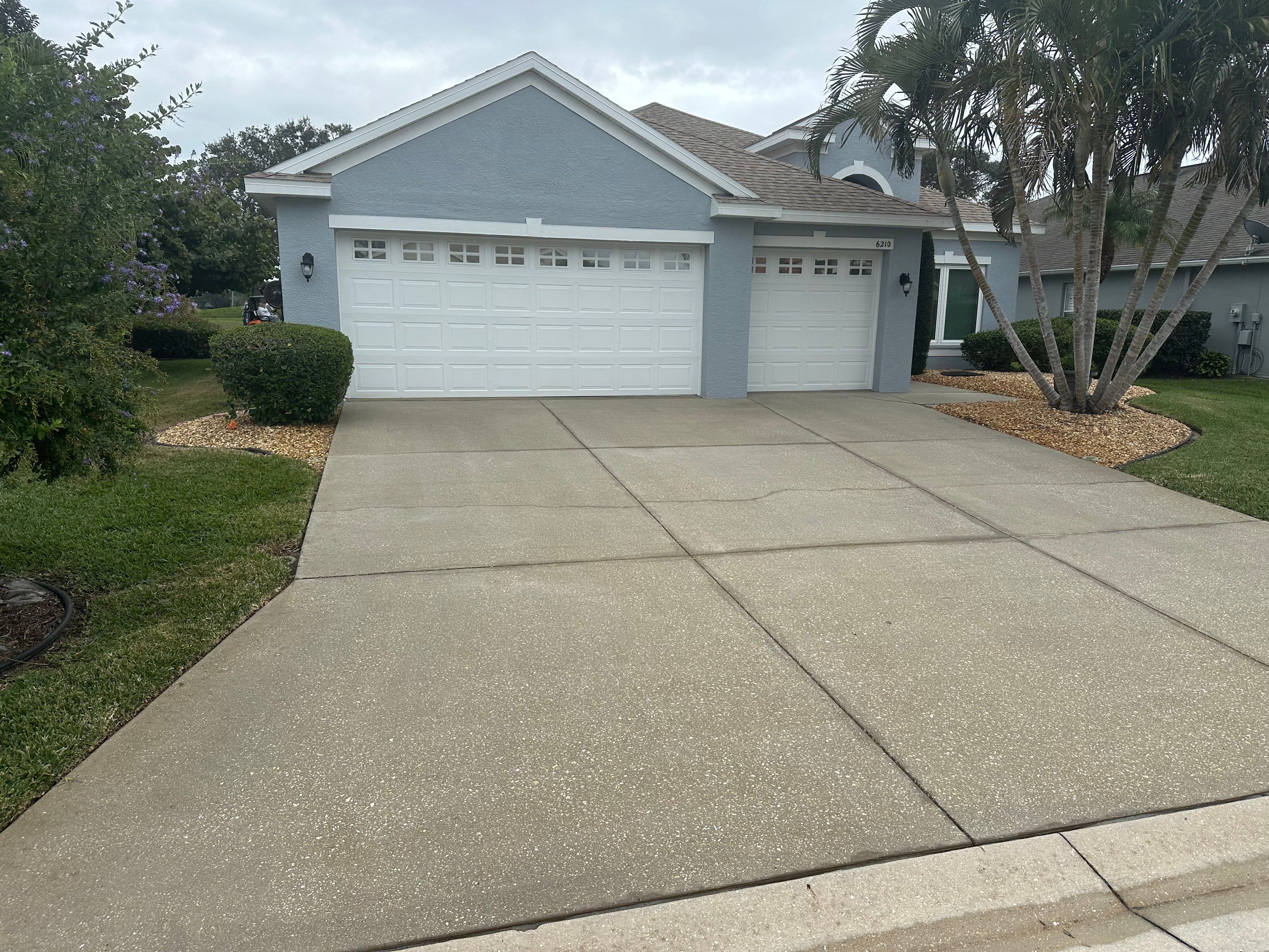 Concrete Driveway, Entryway & Street Curbing Cleaning in Fairways at Imperial Lakes, Palmetto, FL | Sunshine AquaWash by Sunshine AquaWash