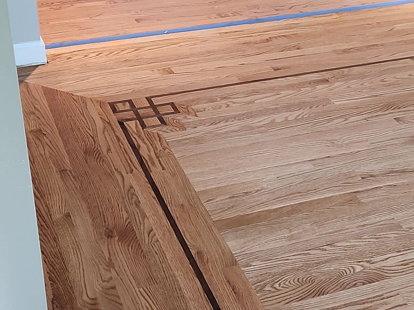 Ann Arbor Elegance: Red Oak and Walnut Living Room Masterpiece by Ann Arbor Hardwoods