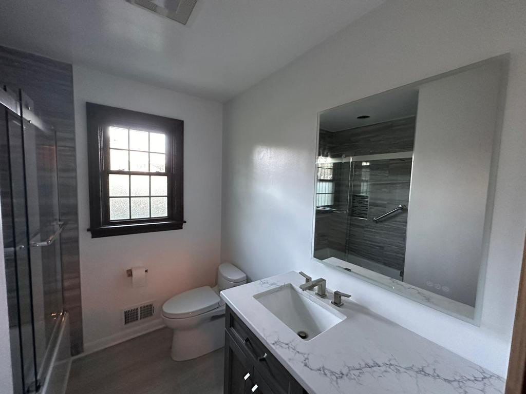 Bathroom Remodel using Tile by Home Concepts Construction