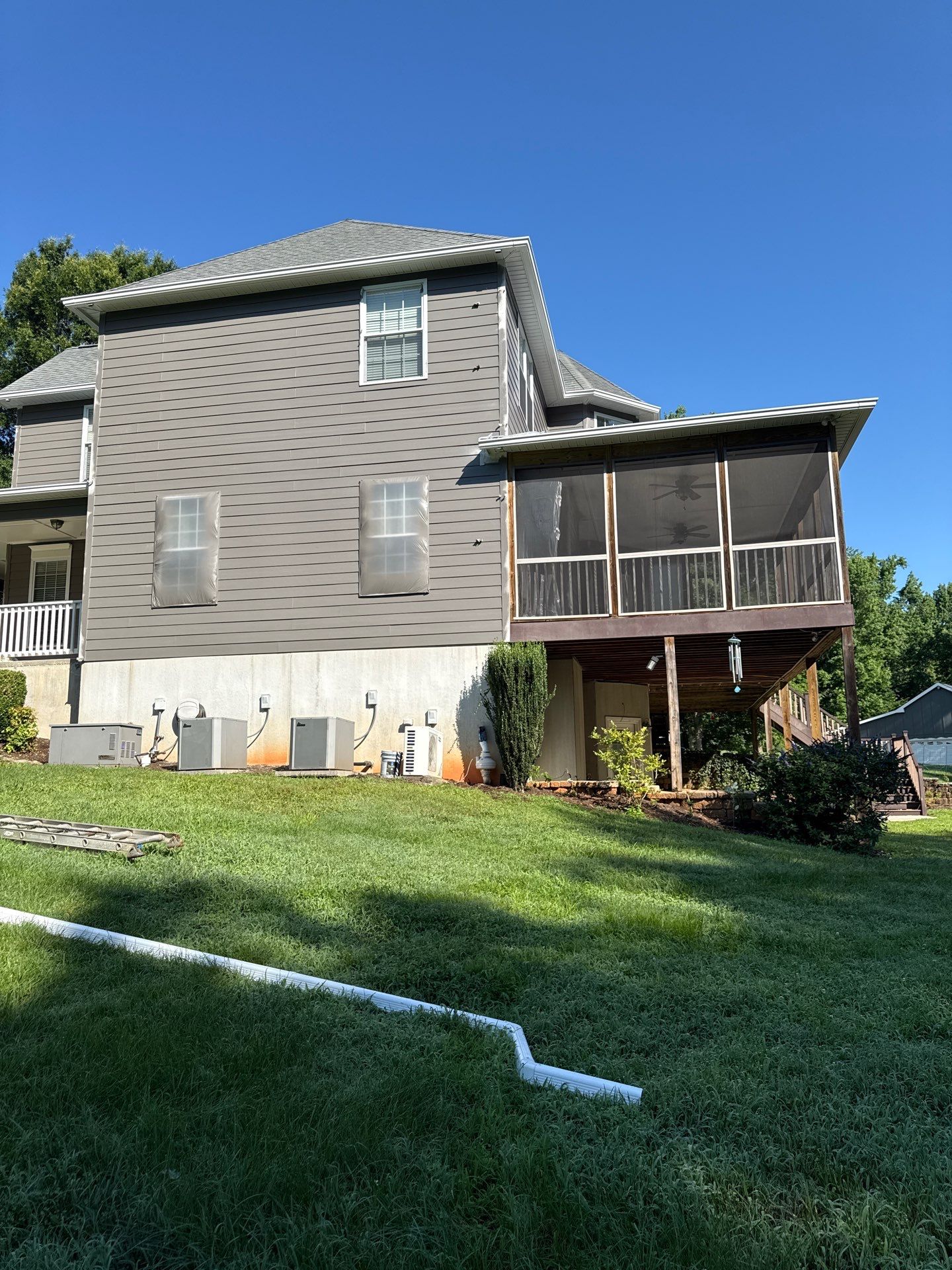 Siding replacement, exterior painting, and front door staining. by GonzalezPainters & Contractors Inc