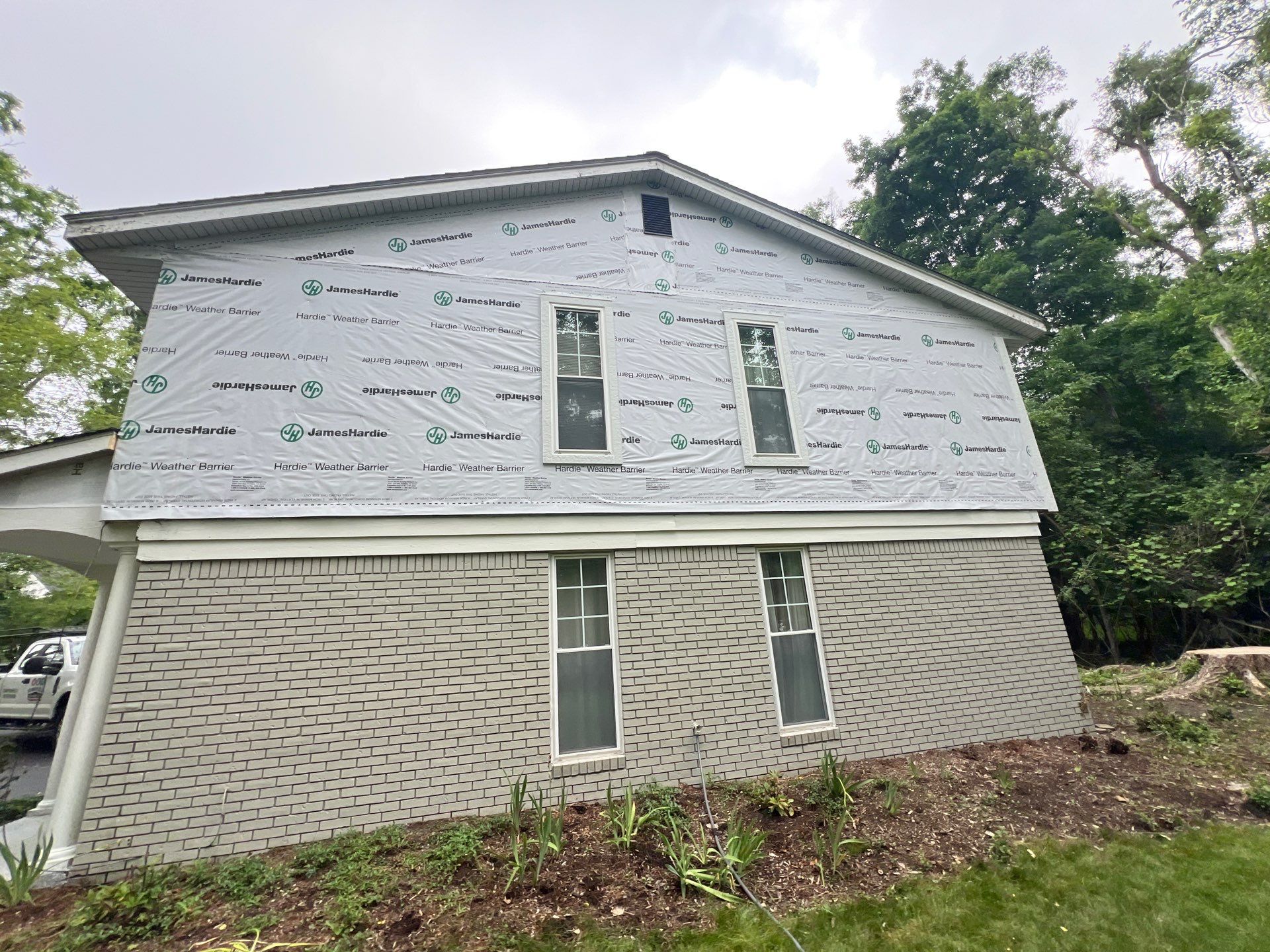 James Hardie Siding Replacement & Metal Roof by Bloomfield Construction & Restoration