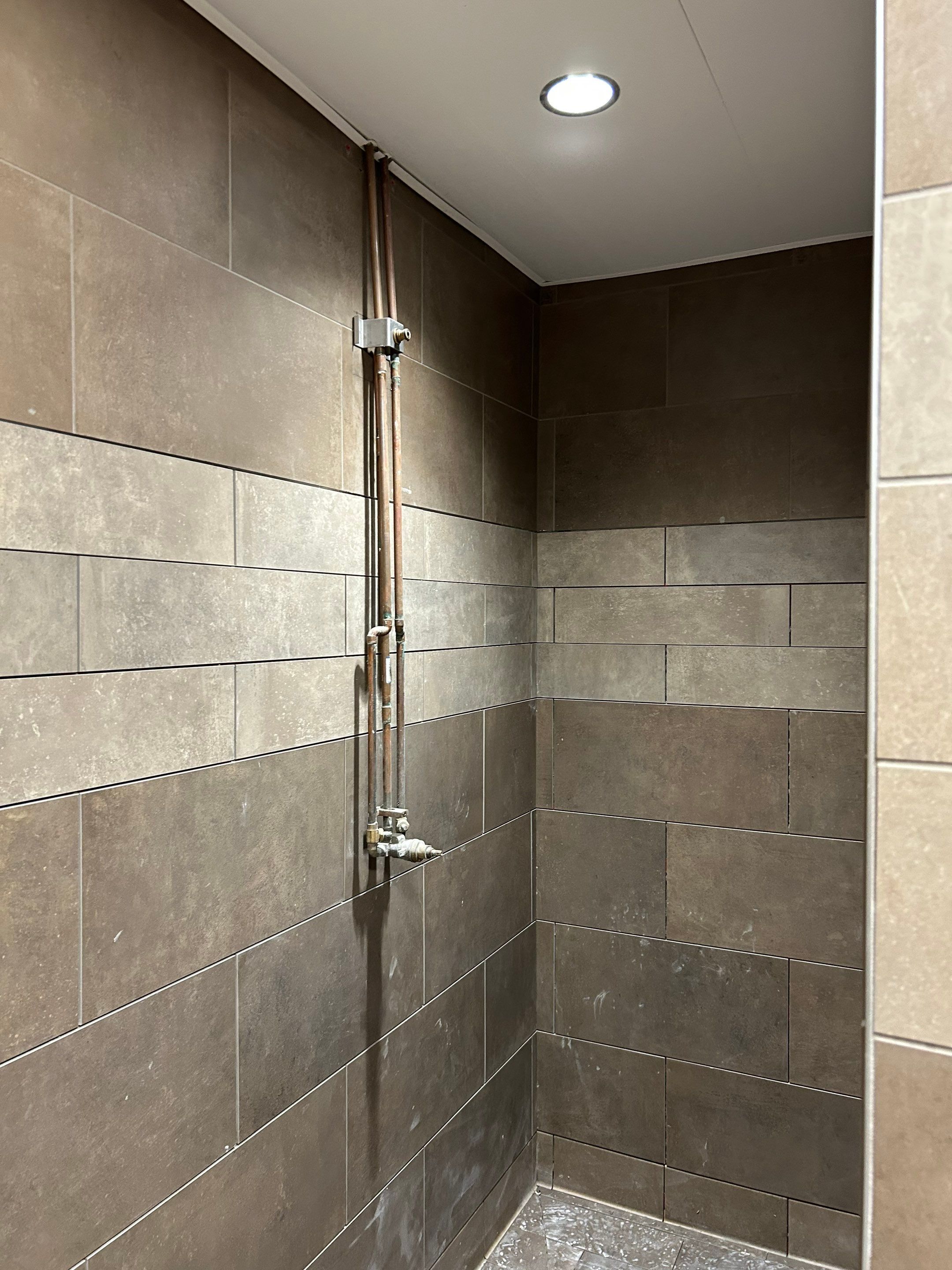 Trucking company showers by Footprints Floors of Nashville