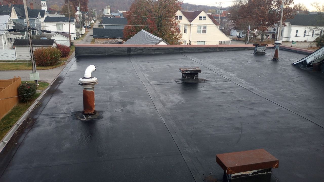 Commercial Roofing Installation using Performance Shingles by Mr. Roofer